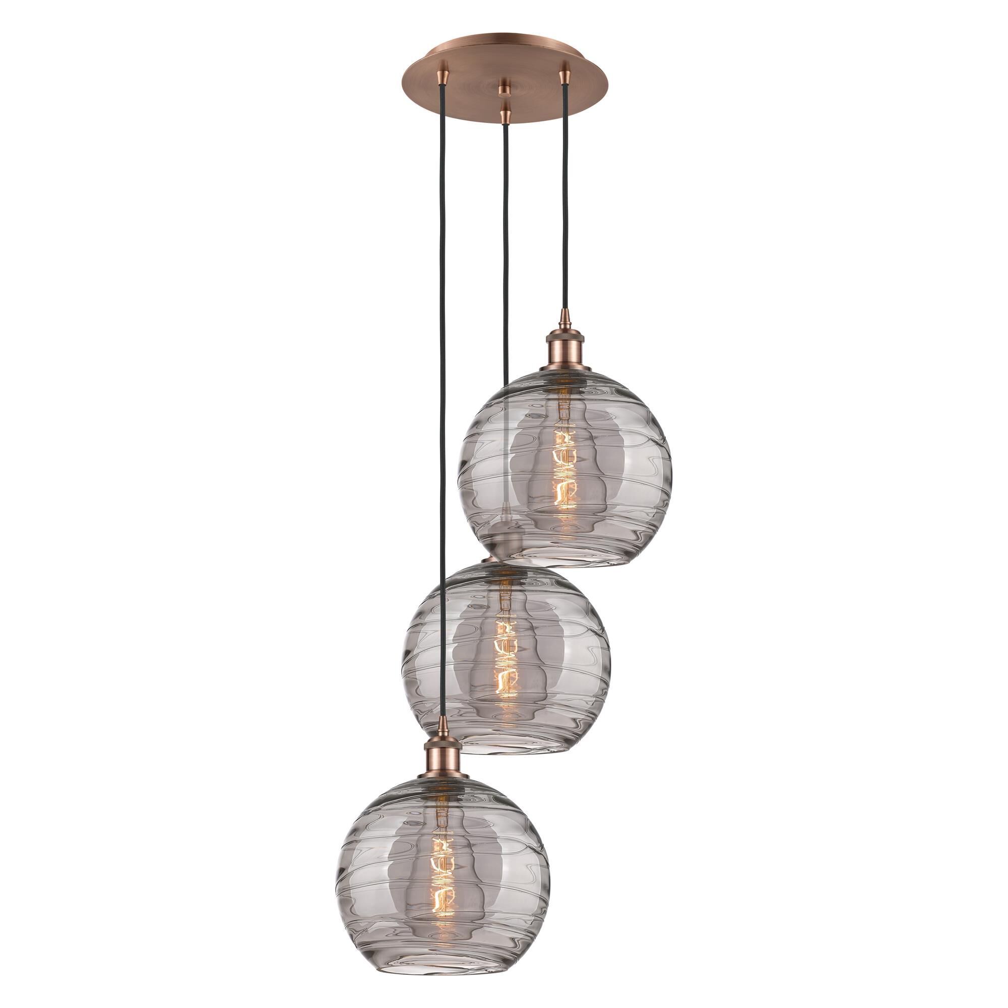 Shown in Antique Copper finish and Light Smoke Deco Swirl glass