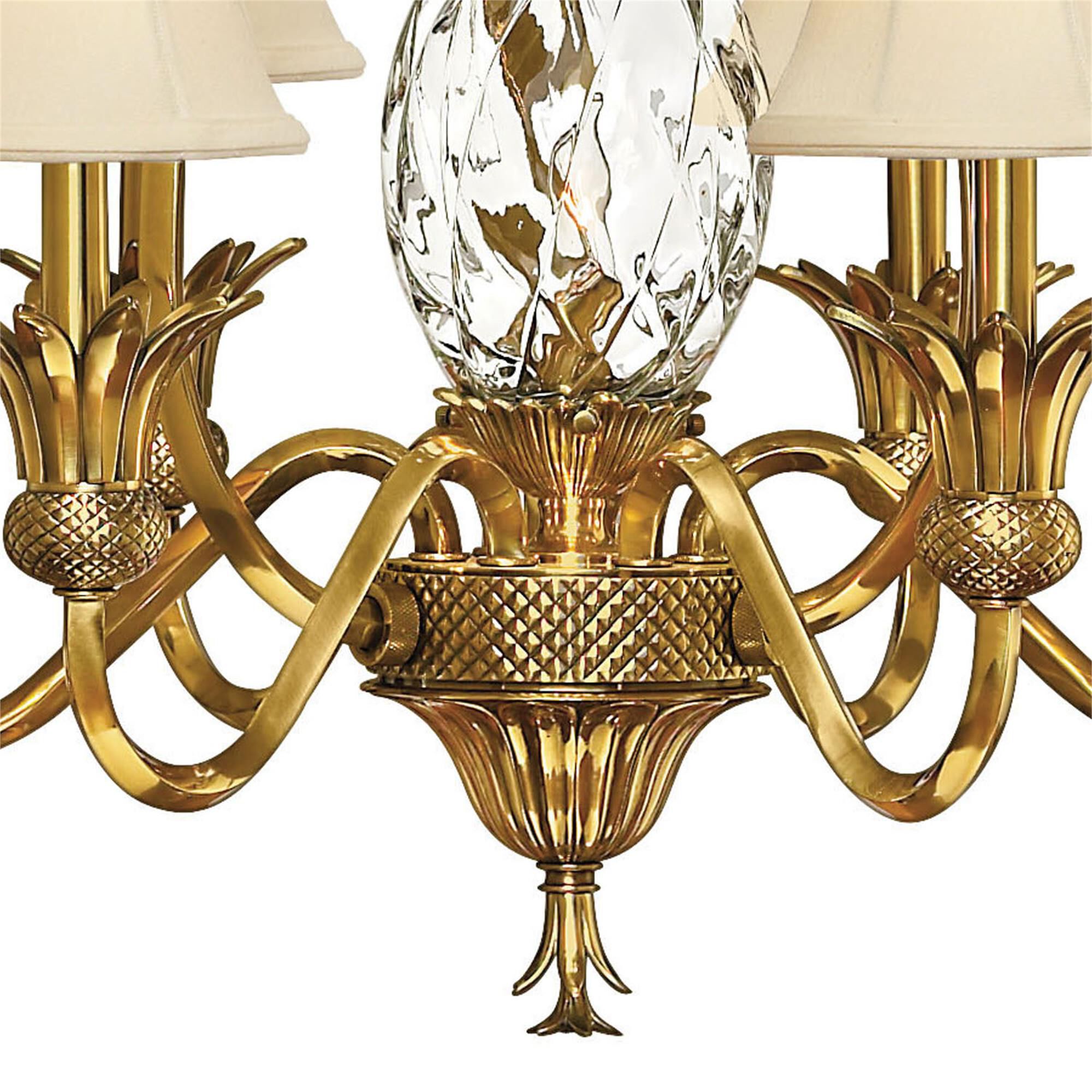 Shown in Burnished Brass finish and Clear Optic glass and Ivory Silk shade