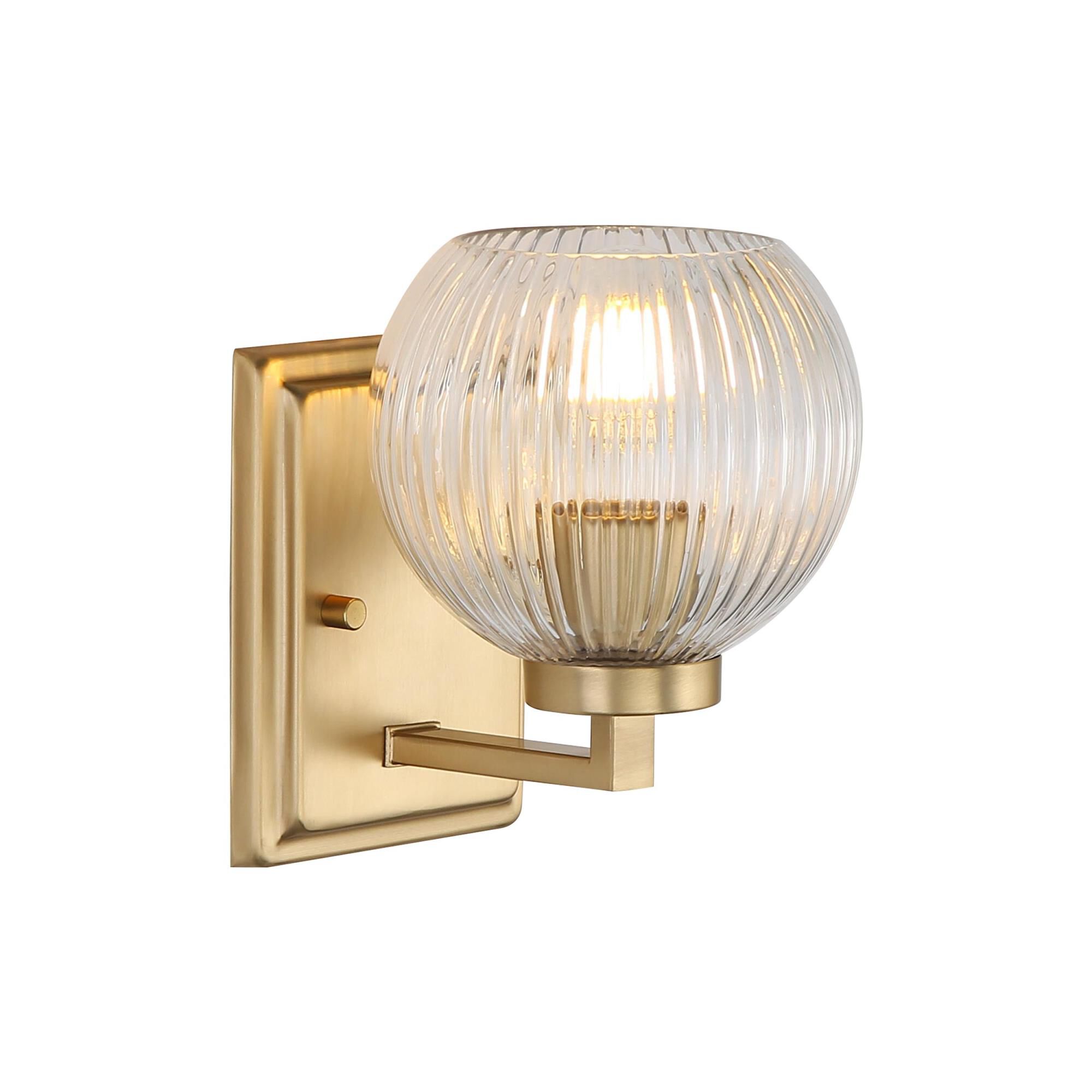 Shown in Brushed Champagne Bronze finish and Ribbed Clear Glass shade