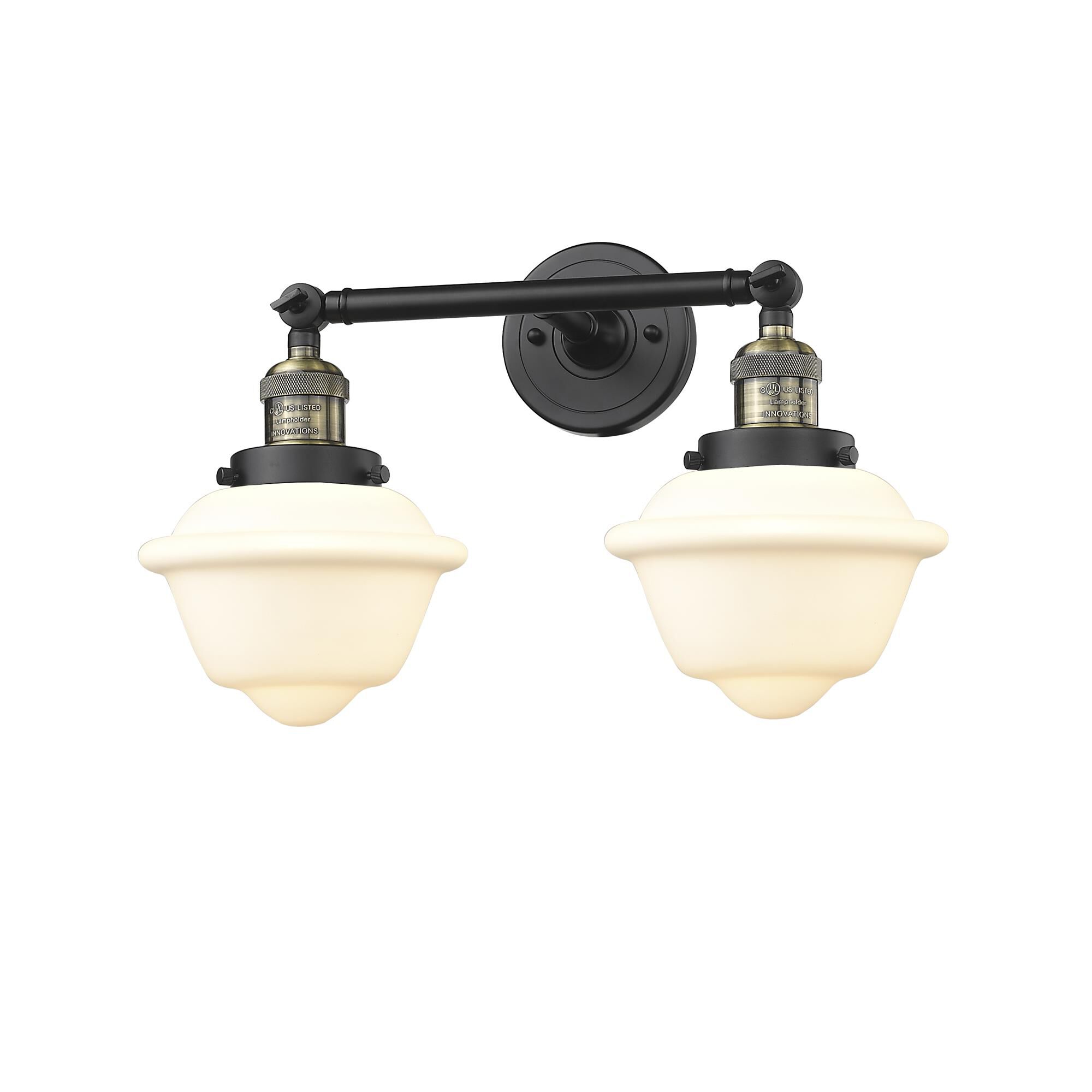 Shown in Black Antique Brass finish and Matte White Cased glass