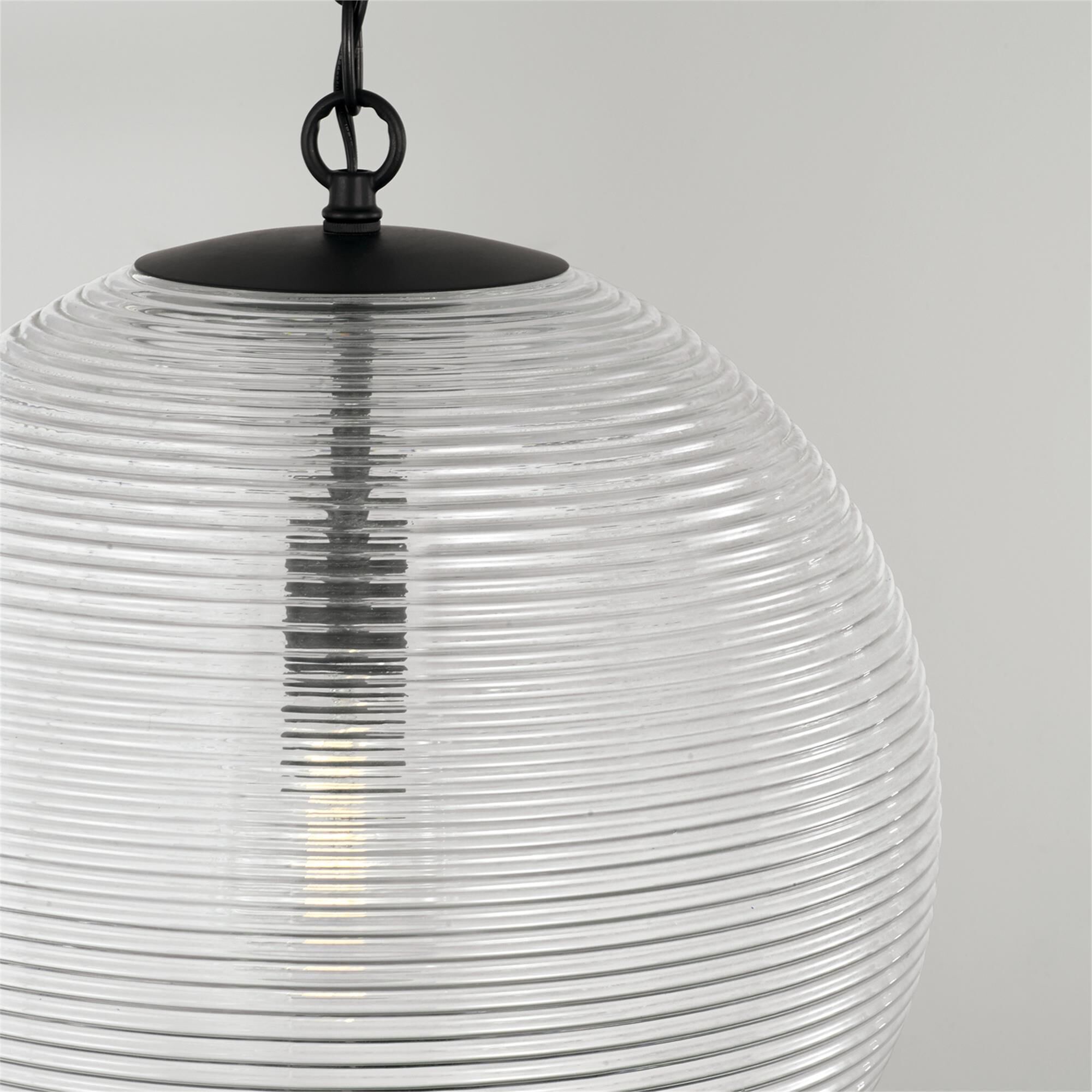 Shown in Matte Black finish and Clear Ribbed glass