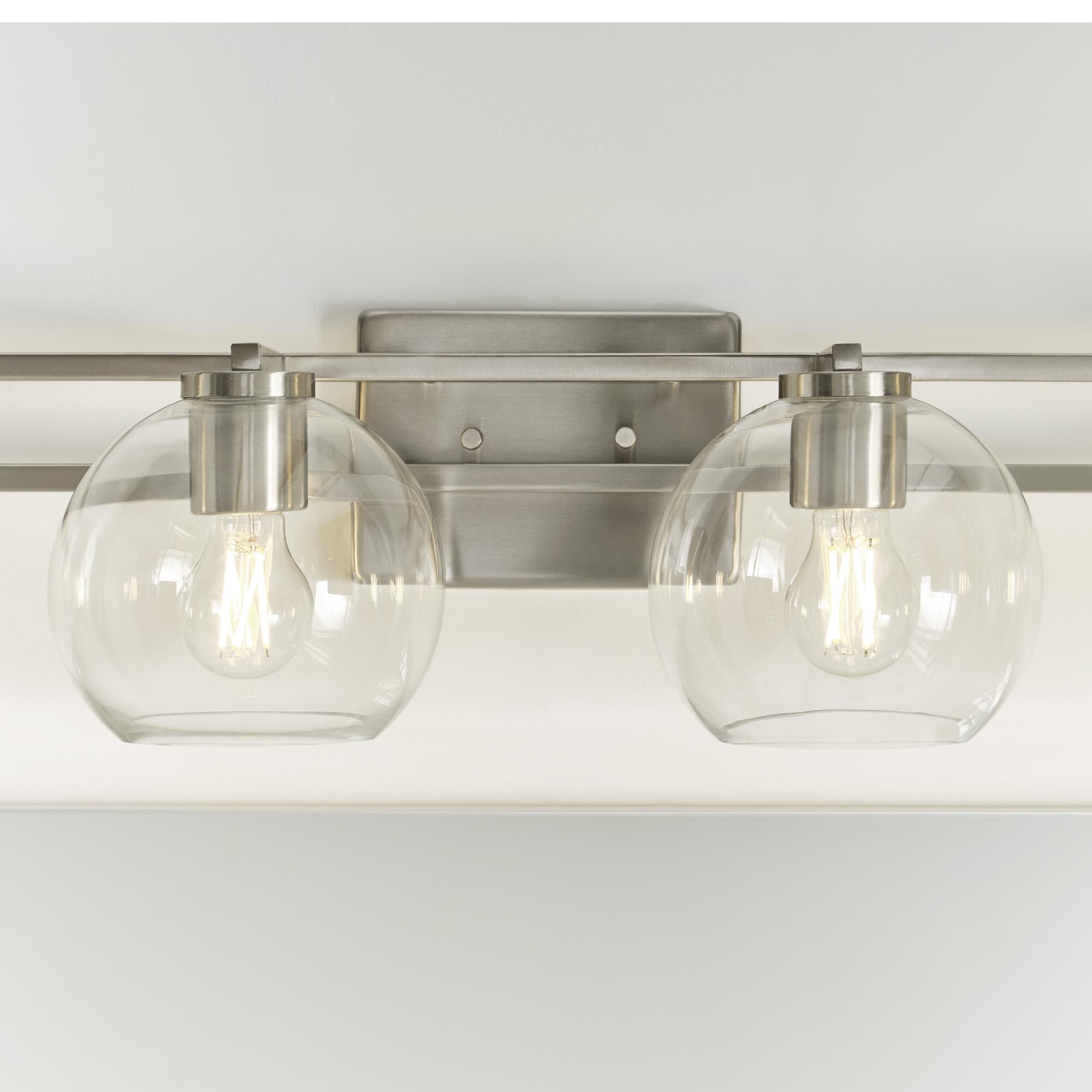 Shown in Brushed Nickel Silver finish and Clear glass