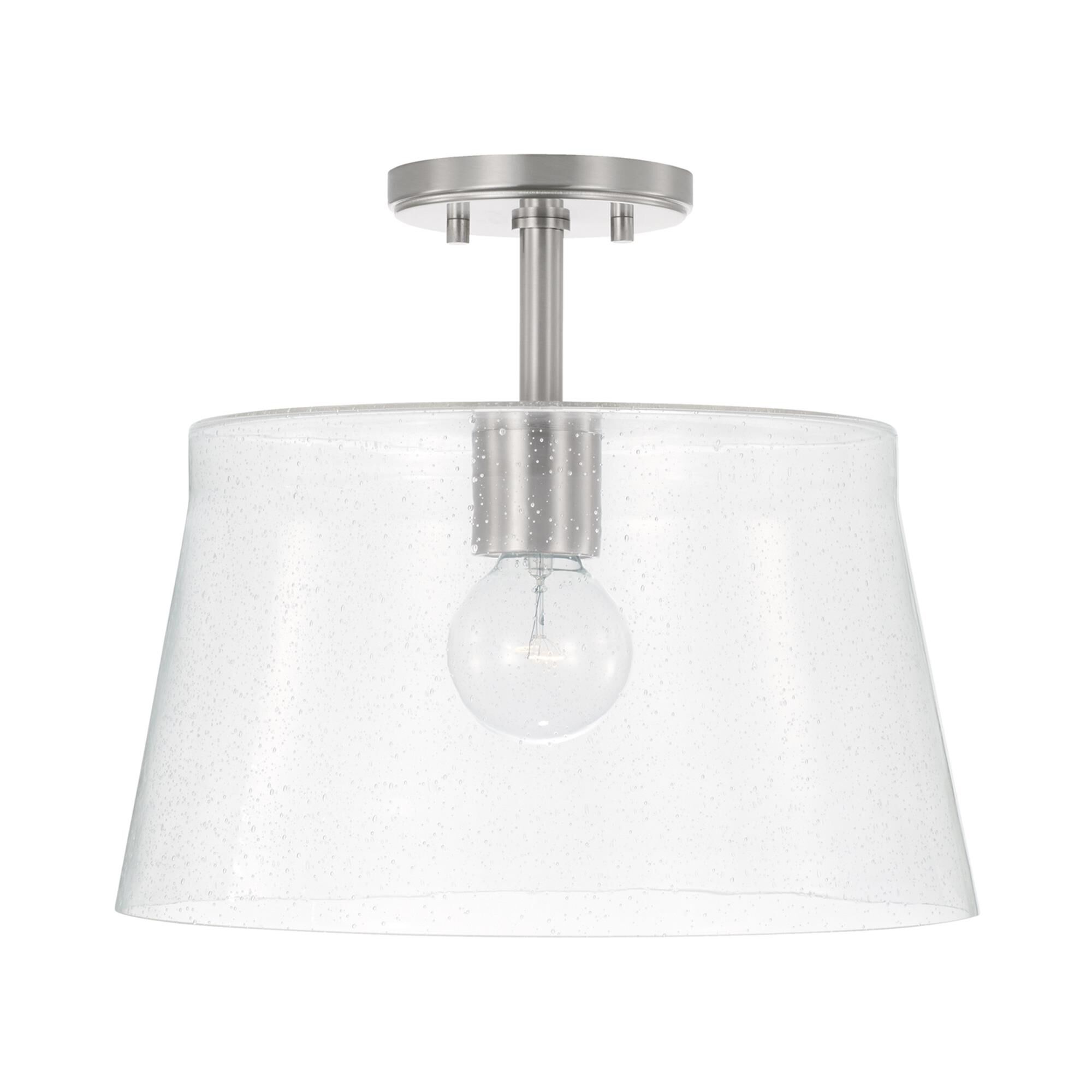 Shown in Brushed Nickel finish and Clear Seeded glass