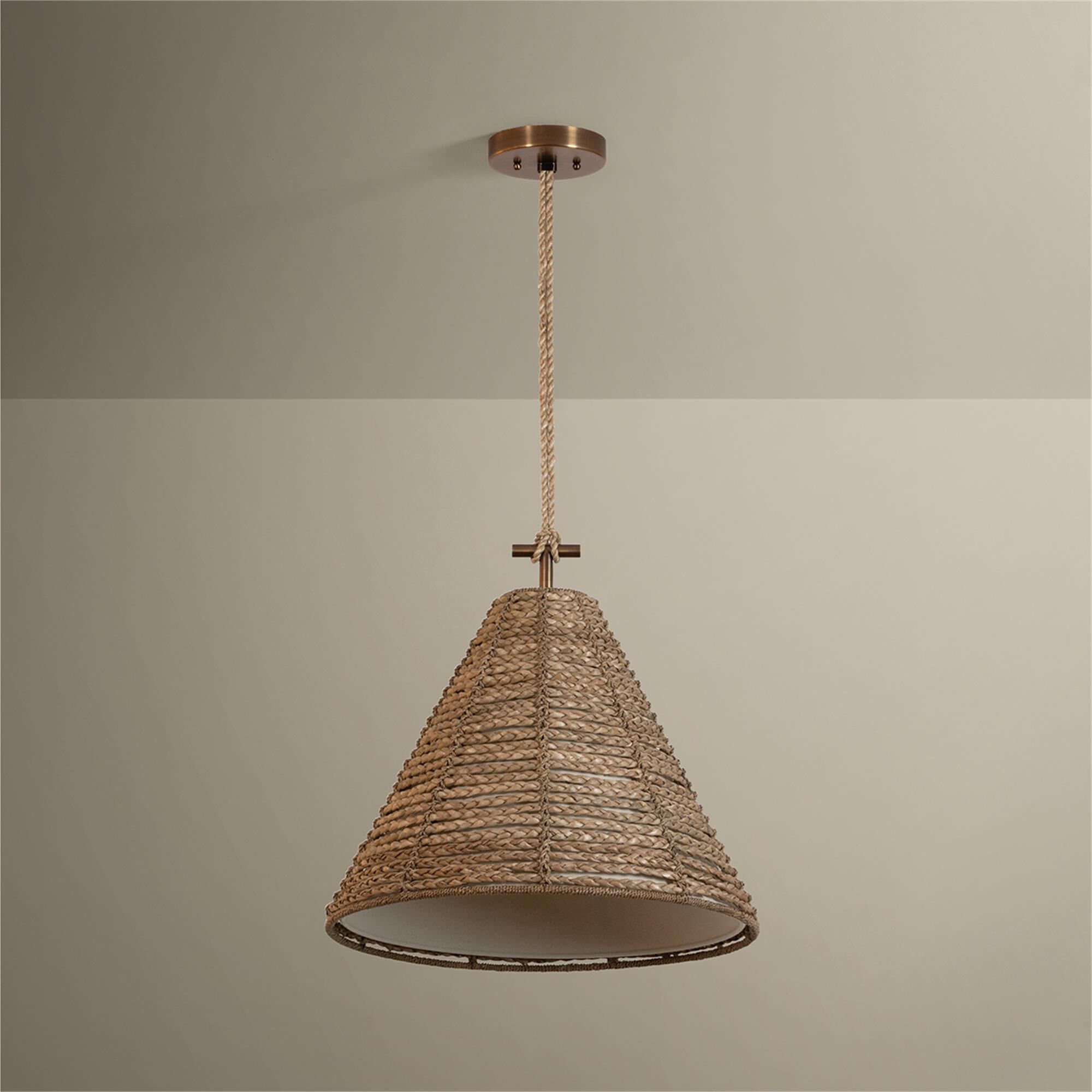Shown in Patina Brass finish and Abaca shade