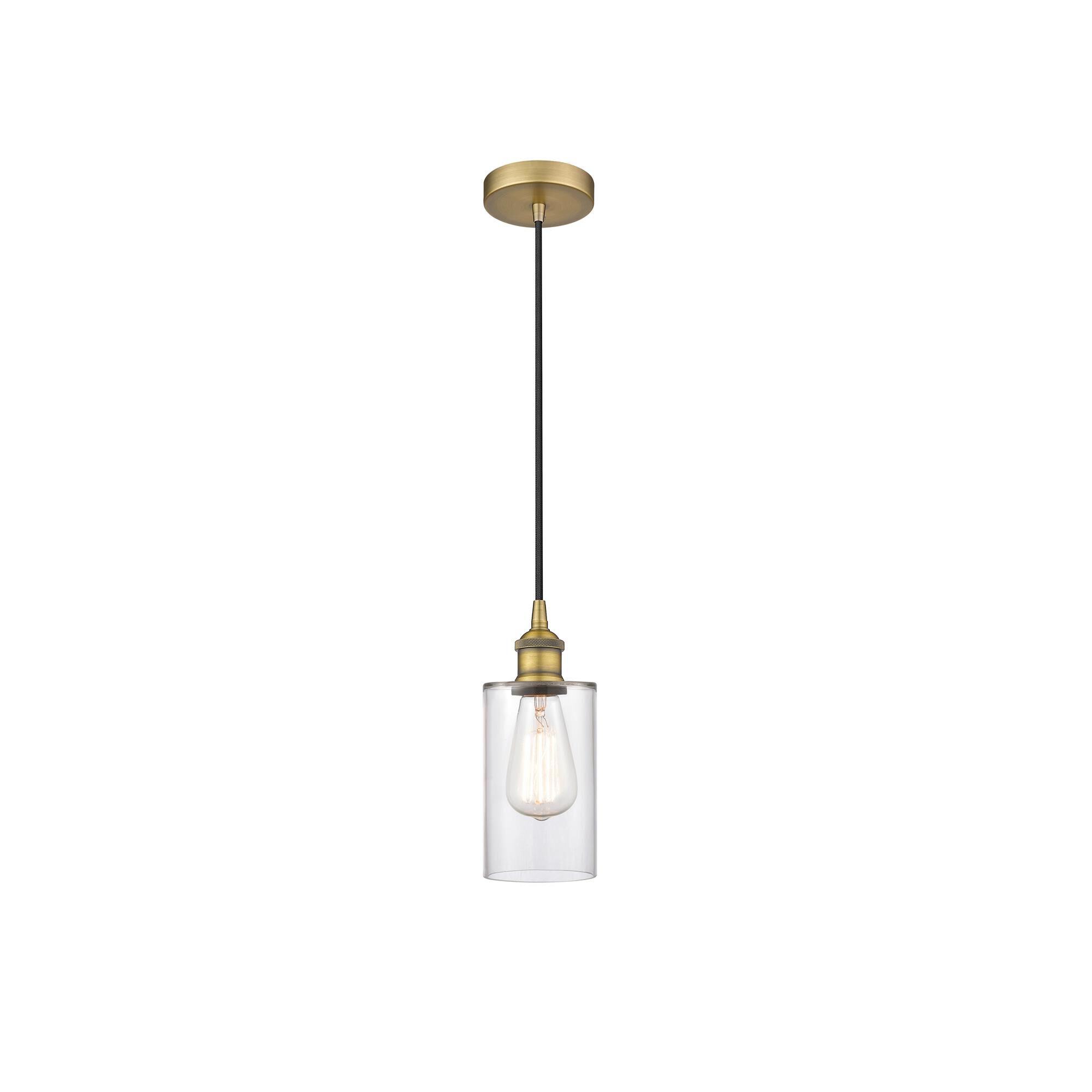 Shown in Brushed Brass finish and Clear glass