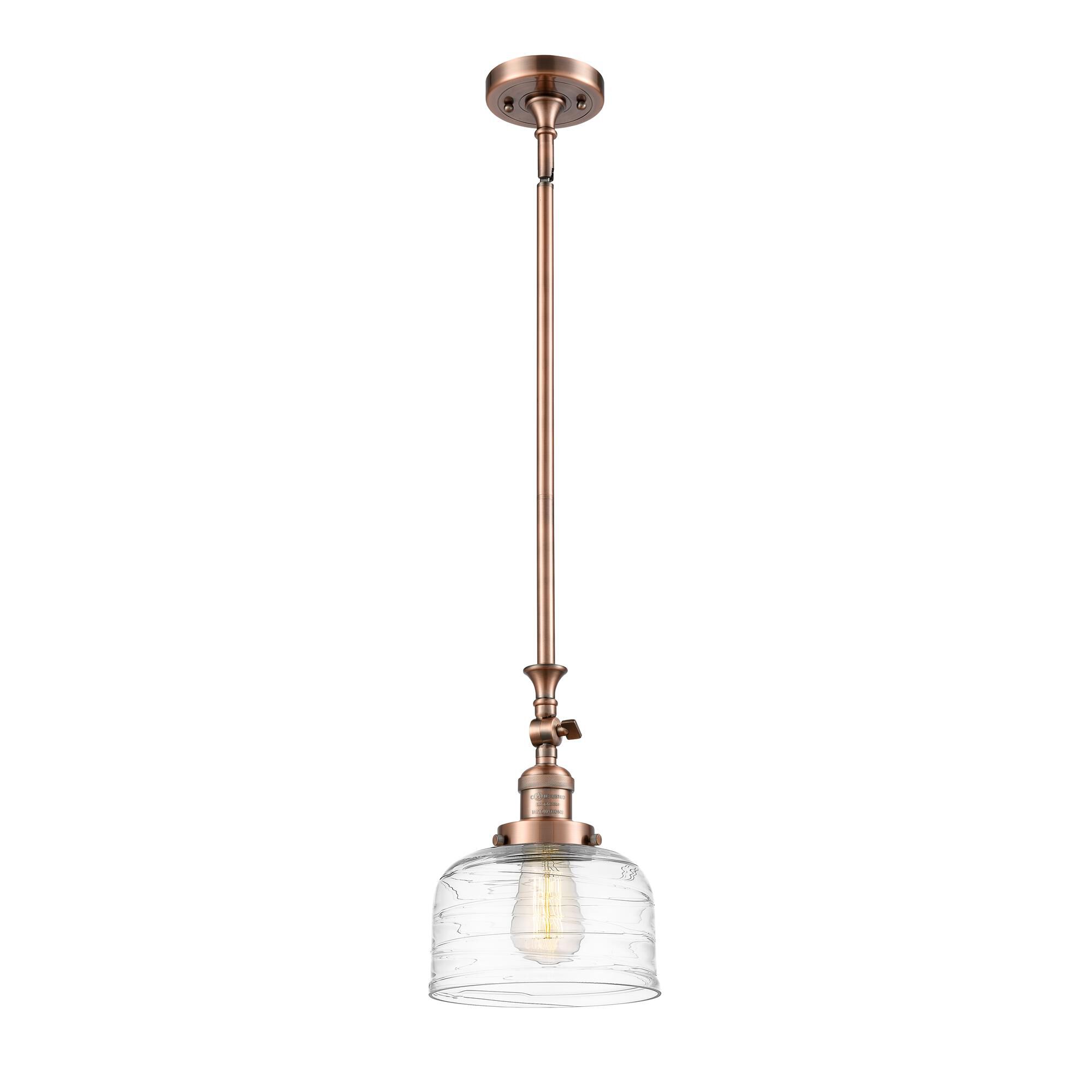 Shown in Antique Copper finish and Deco Swirl glass