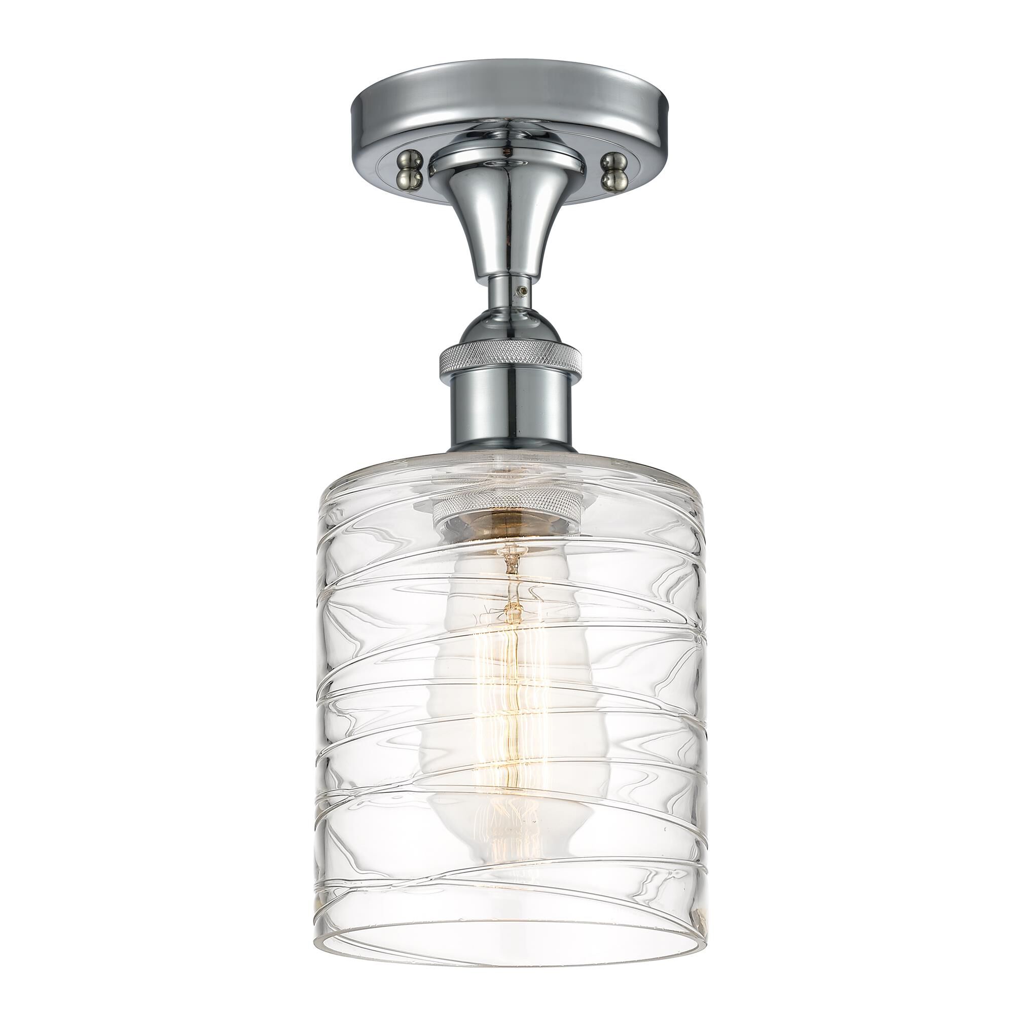 Shown in Polished Chrome finish and Deco Swirl Cobbleskill glass