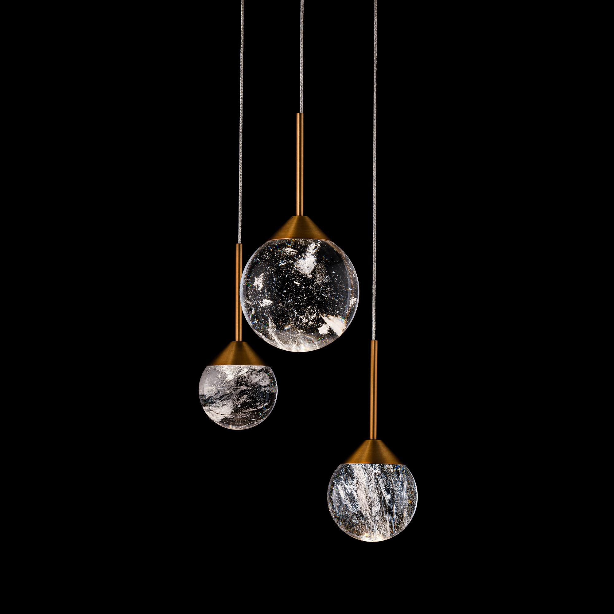 Shown in Aged Brass finish and Clear Optic Haze Crystal glass