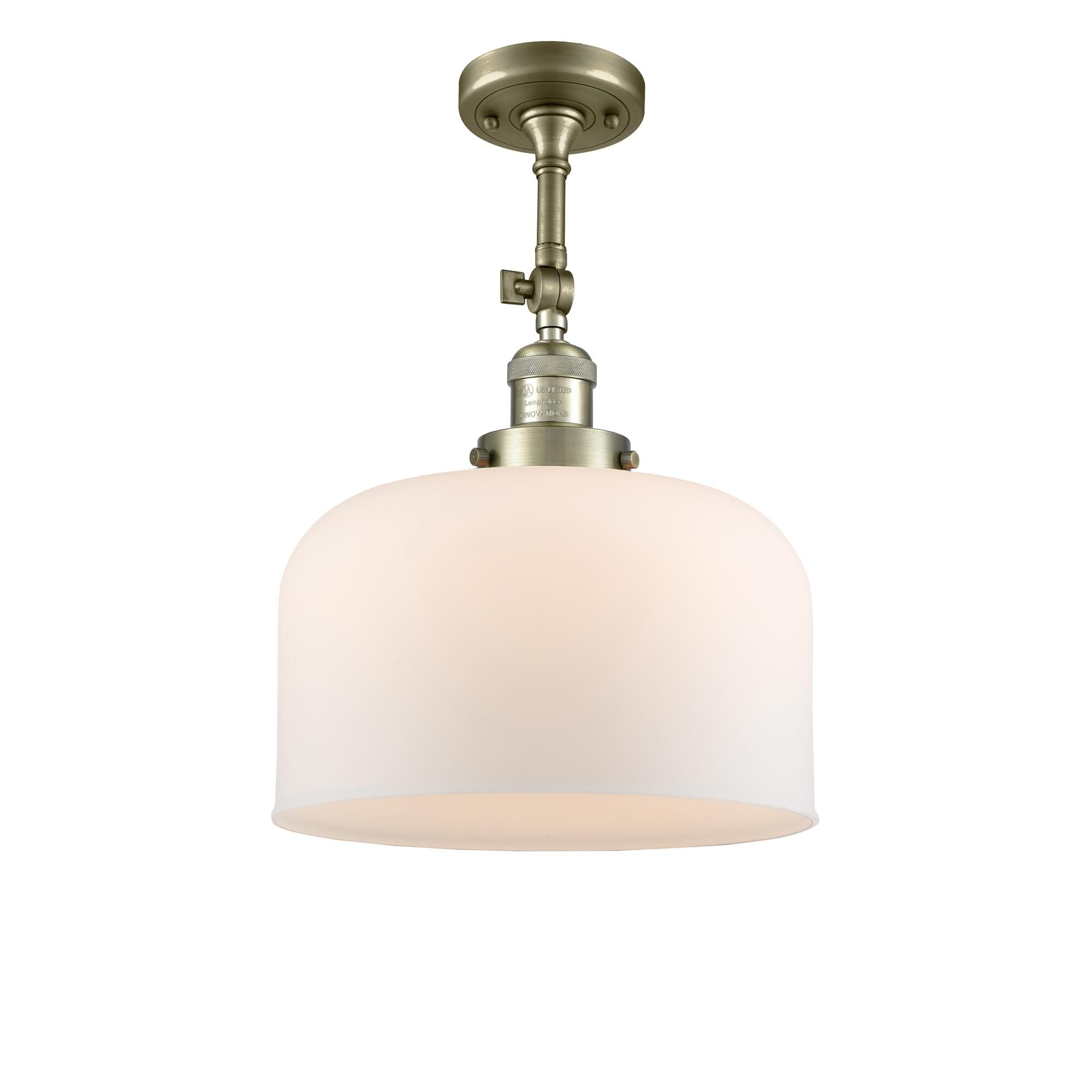 Shown in Antique Brass finish and Matte White Cased glass