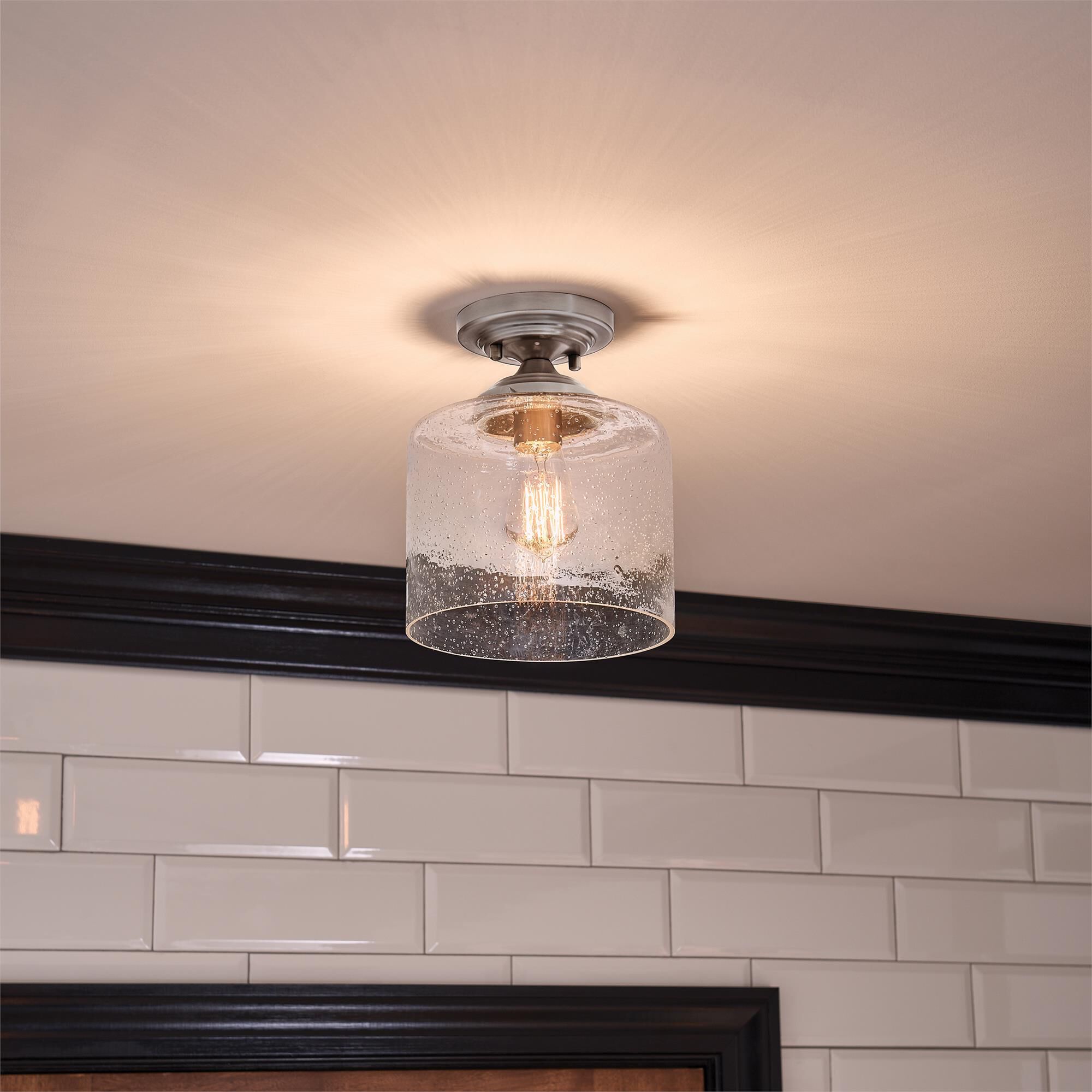 Shown in Brushed Nickel finish and Clear Seeded glass