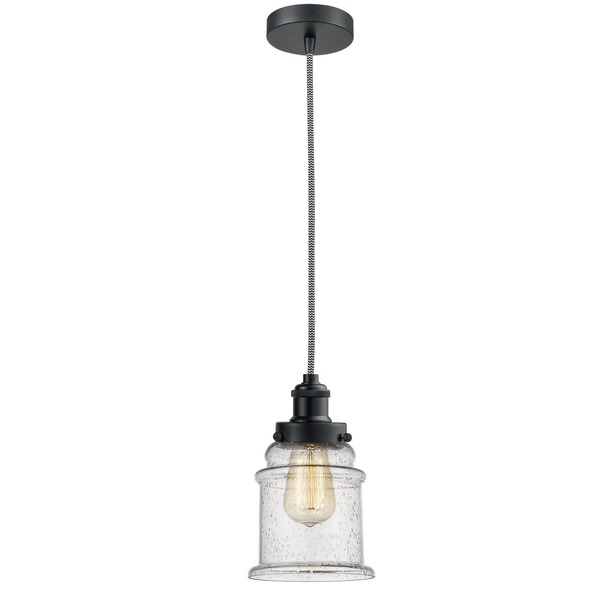 Shown in Matte Black finish and Bell glass and Glass shade and Matte Black Edison Socket Cover accent
