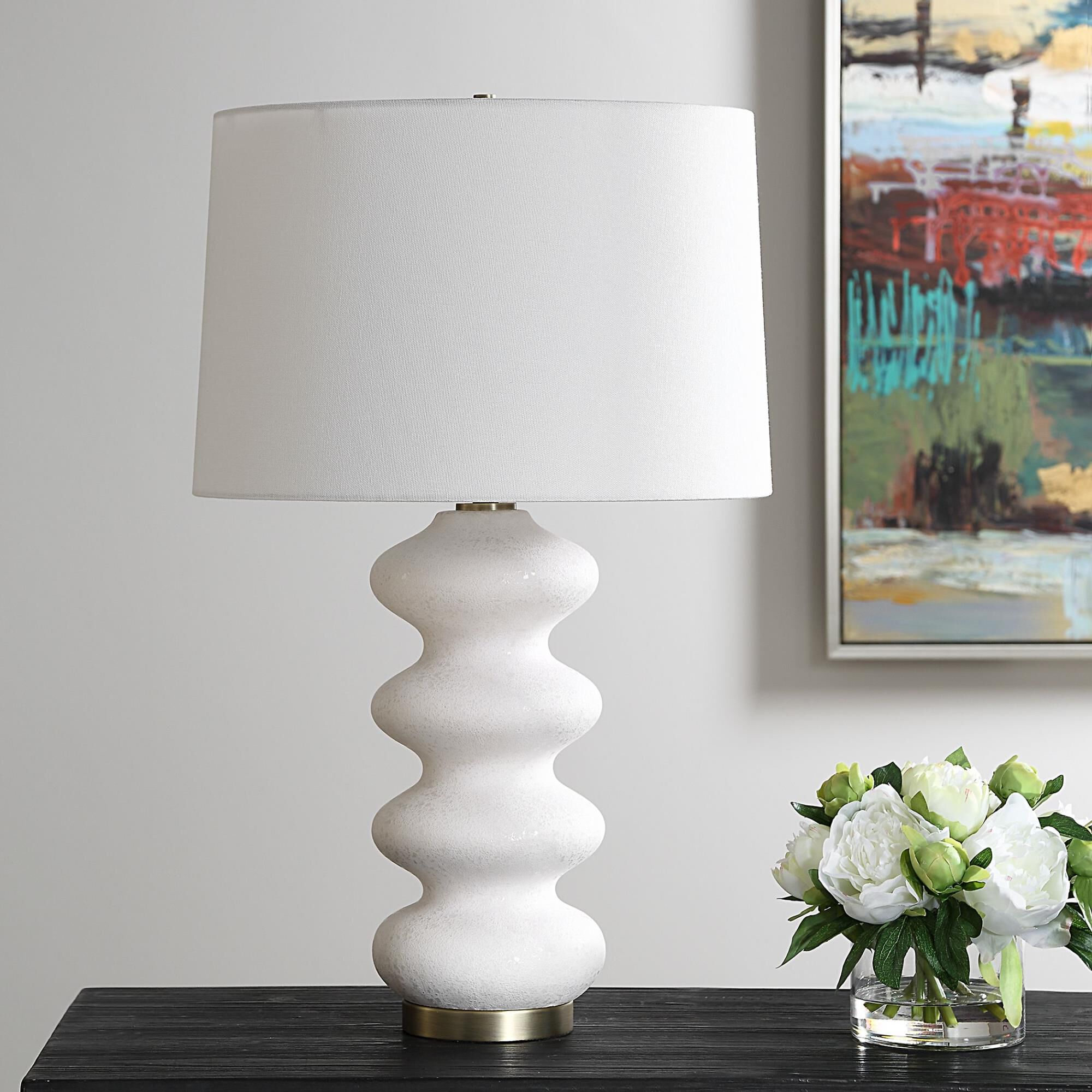 Shown in This Porcelain Lamp Exudes An Elegant Quality With Its Graceful Flowing Design And White Tone-On-Ton finish and Round Hardback shade