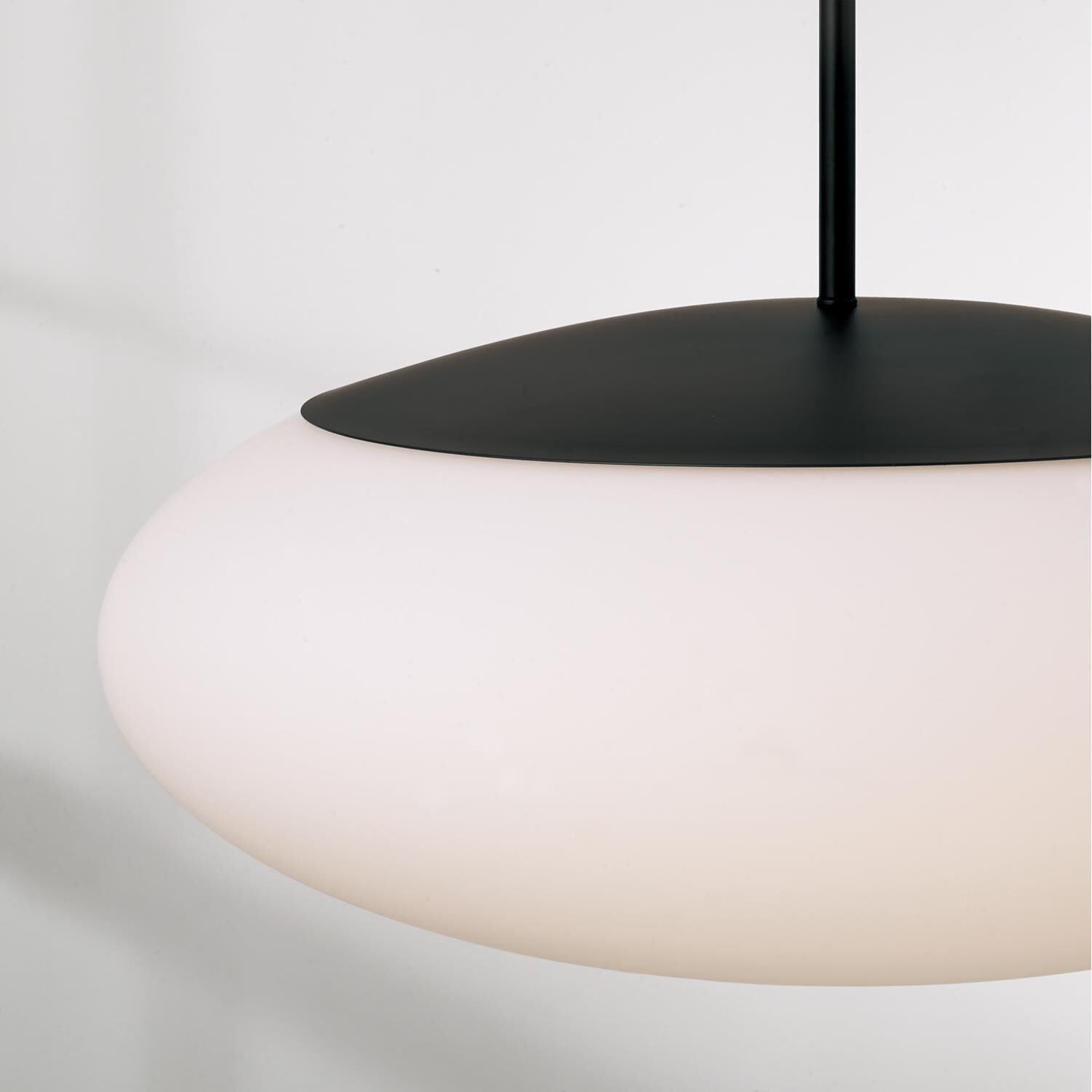 Shown in Matte Black finish and Soft White glass