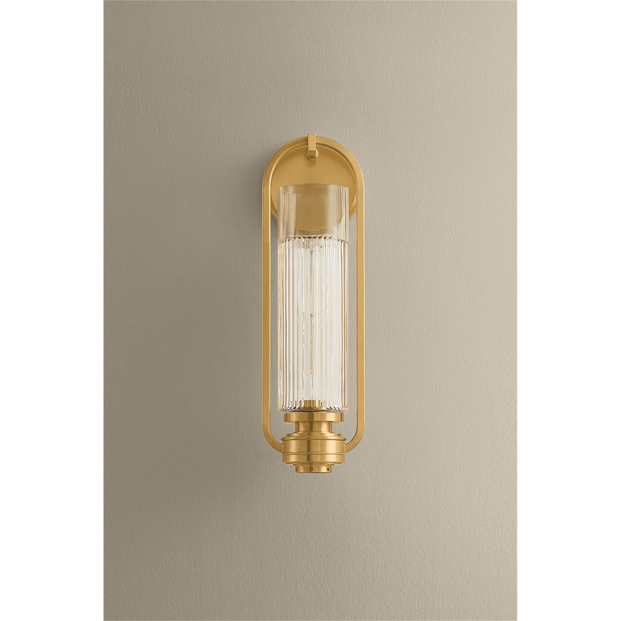 Shown in Aged Brass finish and Clear Optic glass