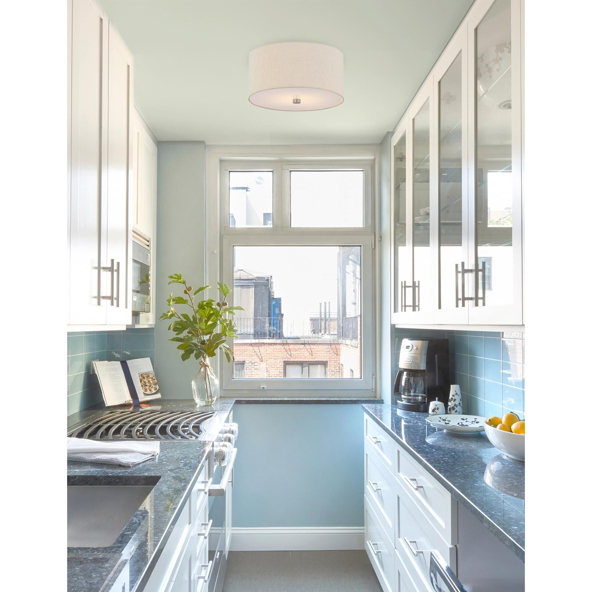 Shown in Brushed Brass finish and Cream Woven Fabric shade