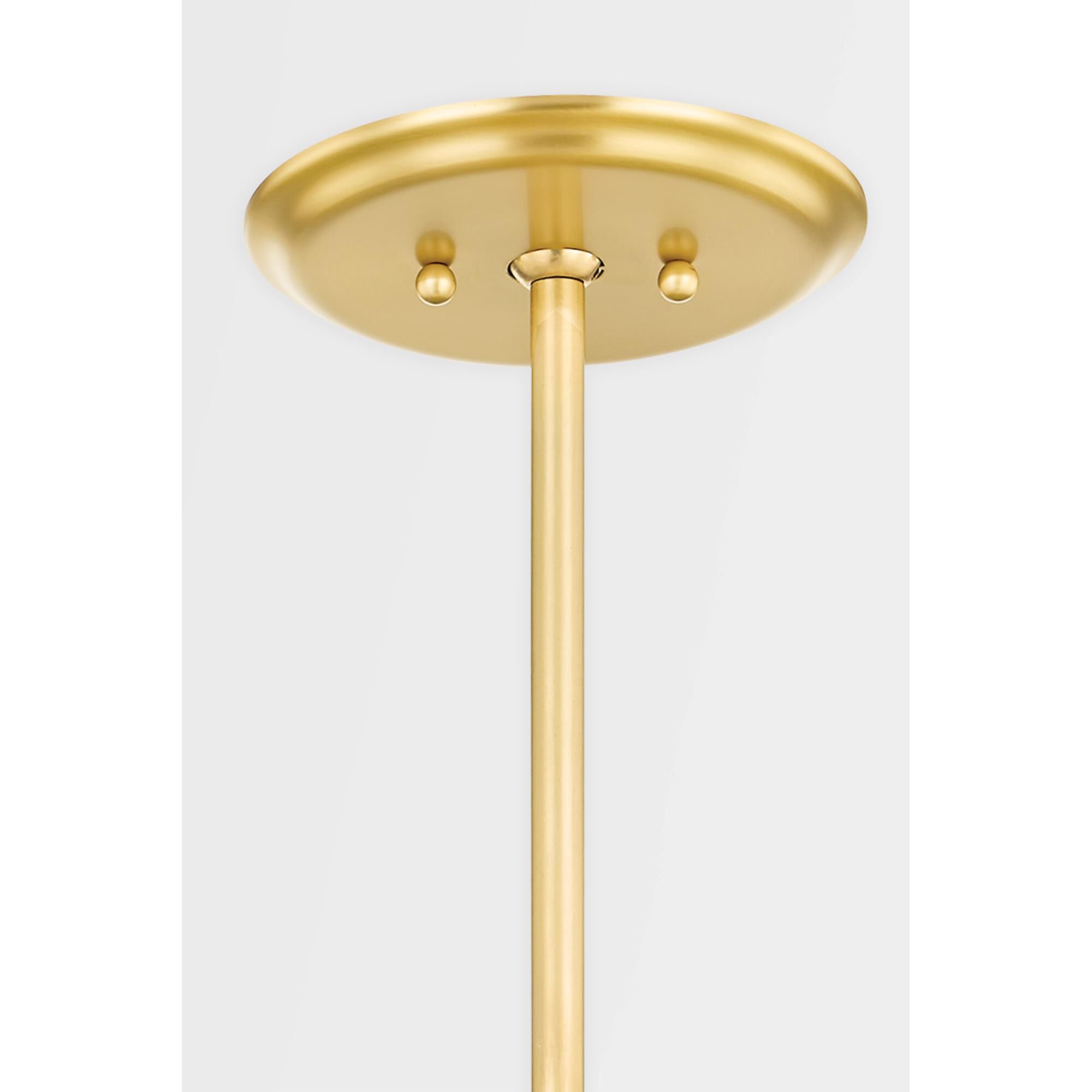 Shown in Aged Brass finish and Opal Matte glass