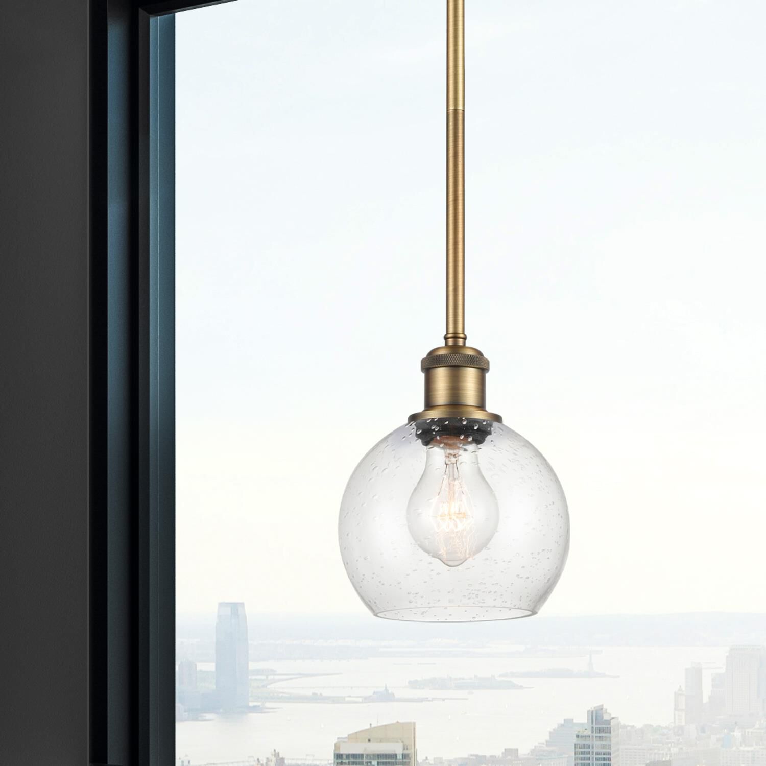 Shown in Brushed Brass finish and Seedy Athens glass and No Shade shade
