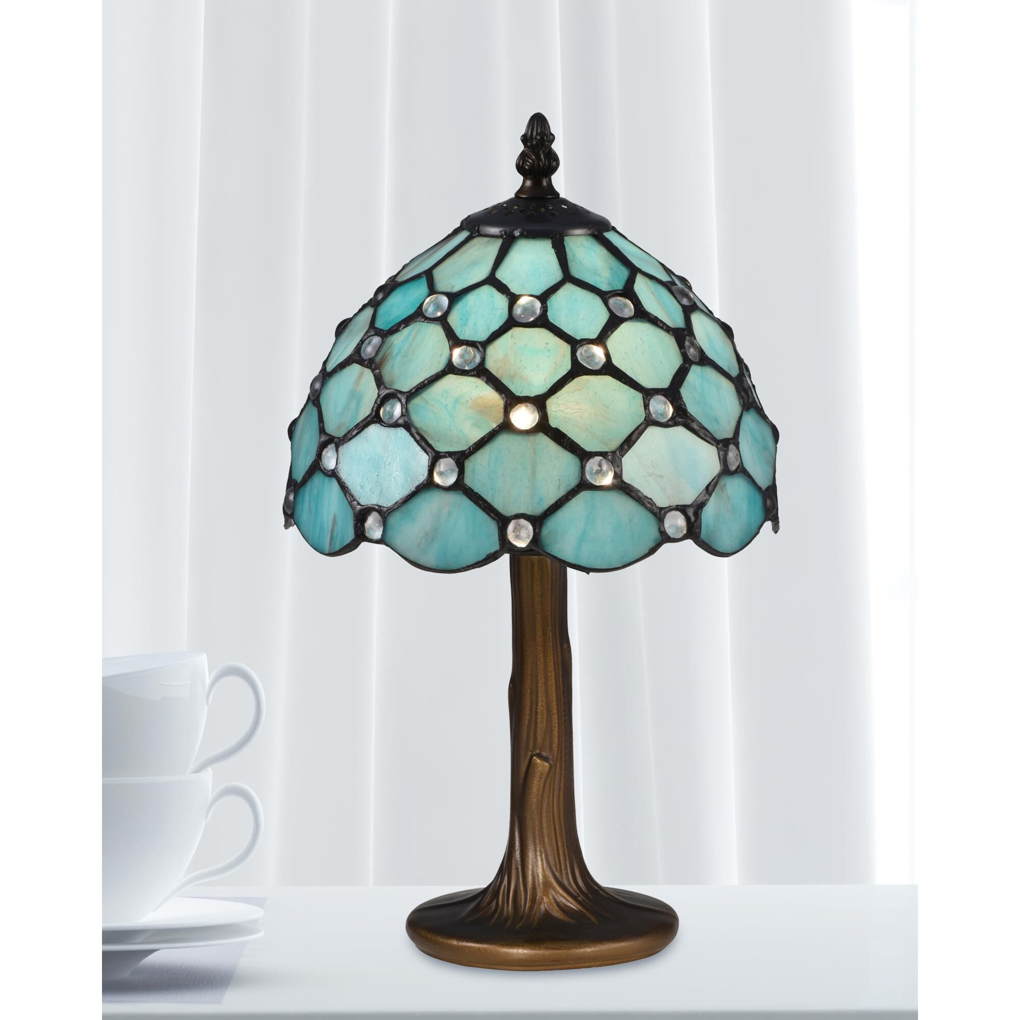 Shown in Antique Bronze finish and Hand Rolled Art (Tiffany) glass