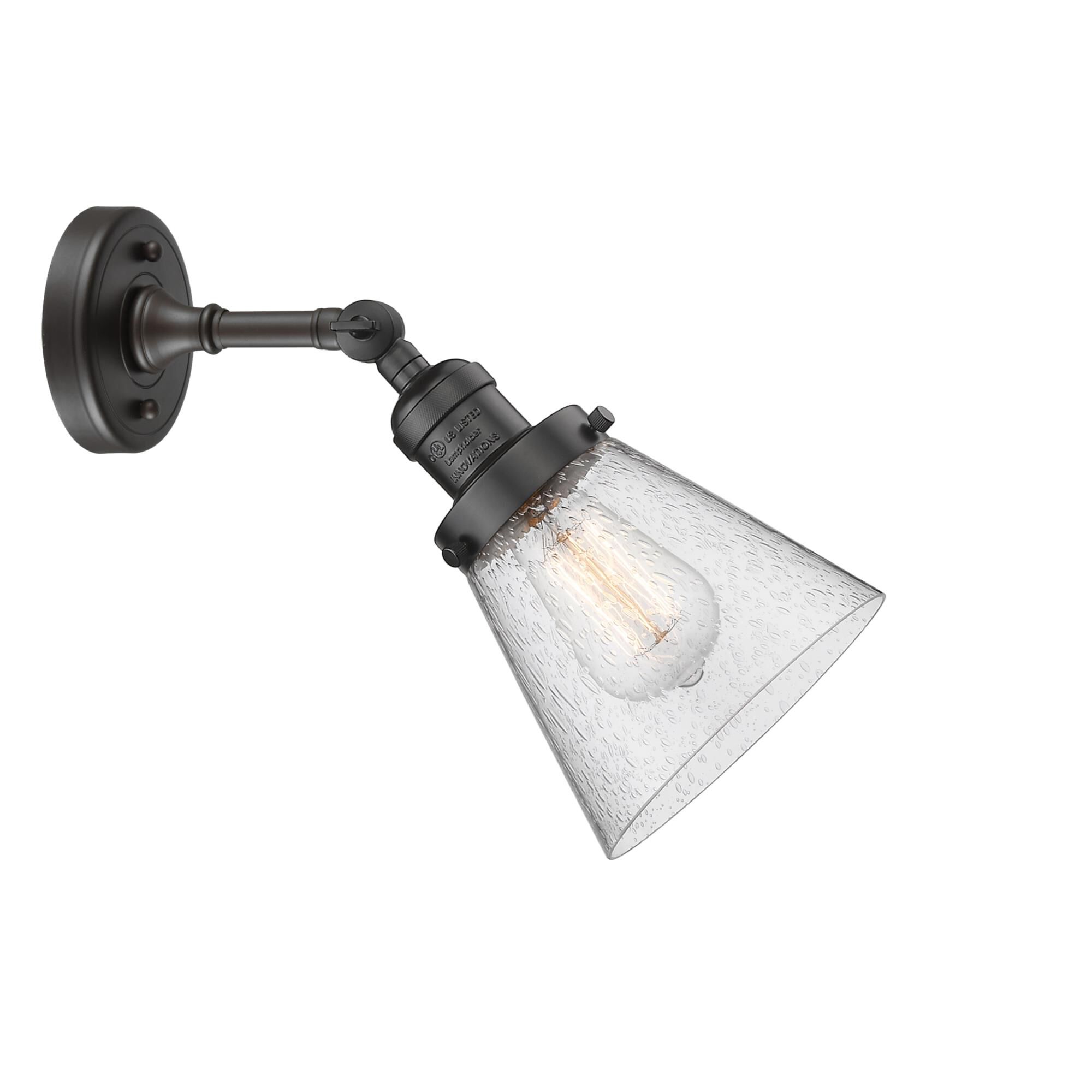 Shown in Oil Rubbed Bronze finish and Seedy glass and None accent