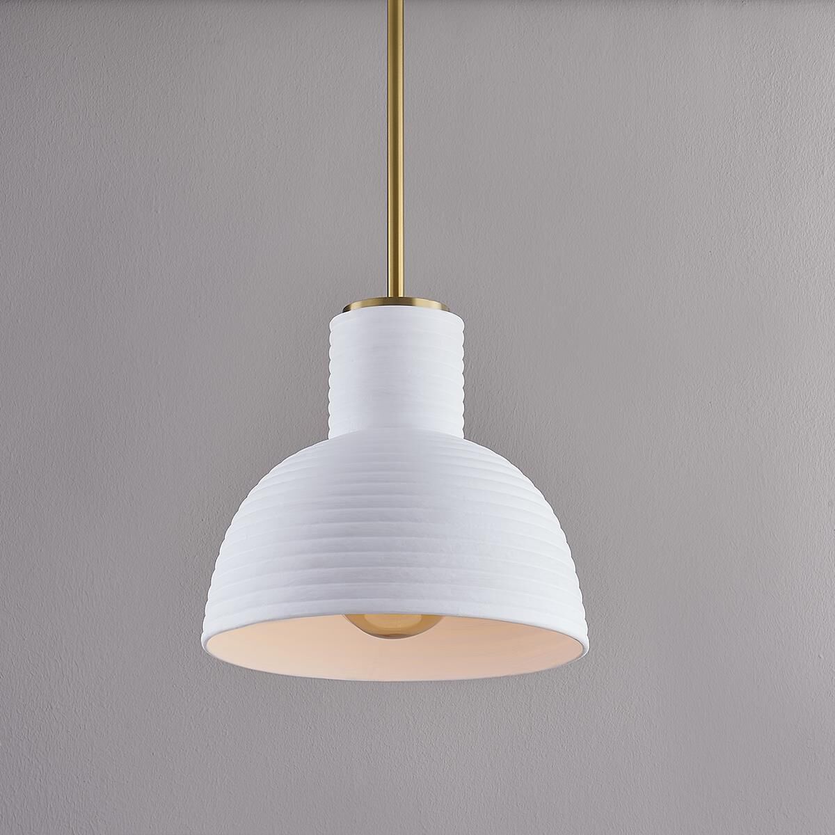 Shown in Aged Brass finish and Ceramic glass