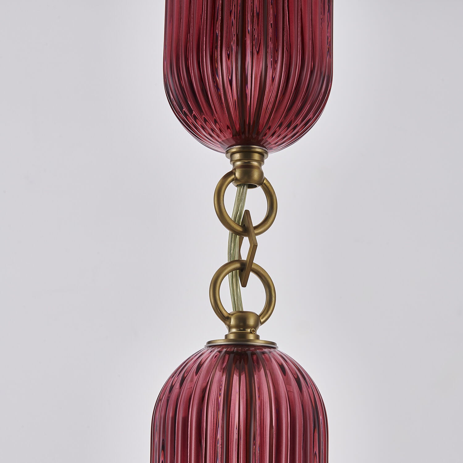 Shown in Satin Brass finish and Peacock Green glass