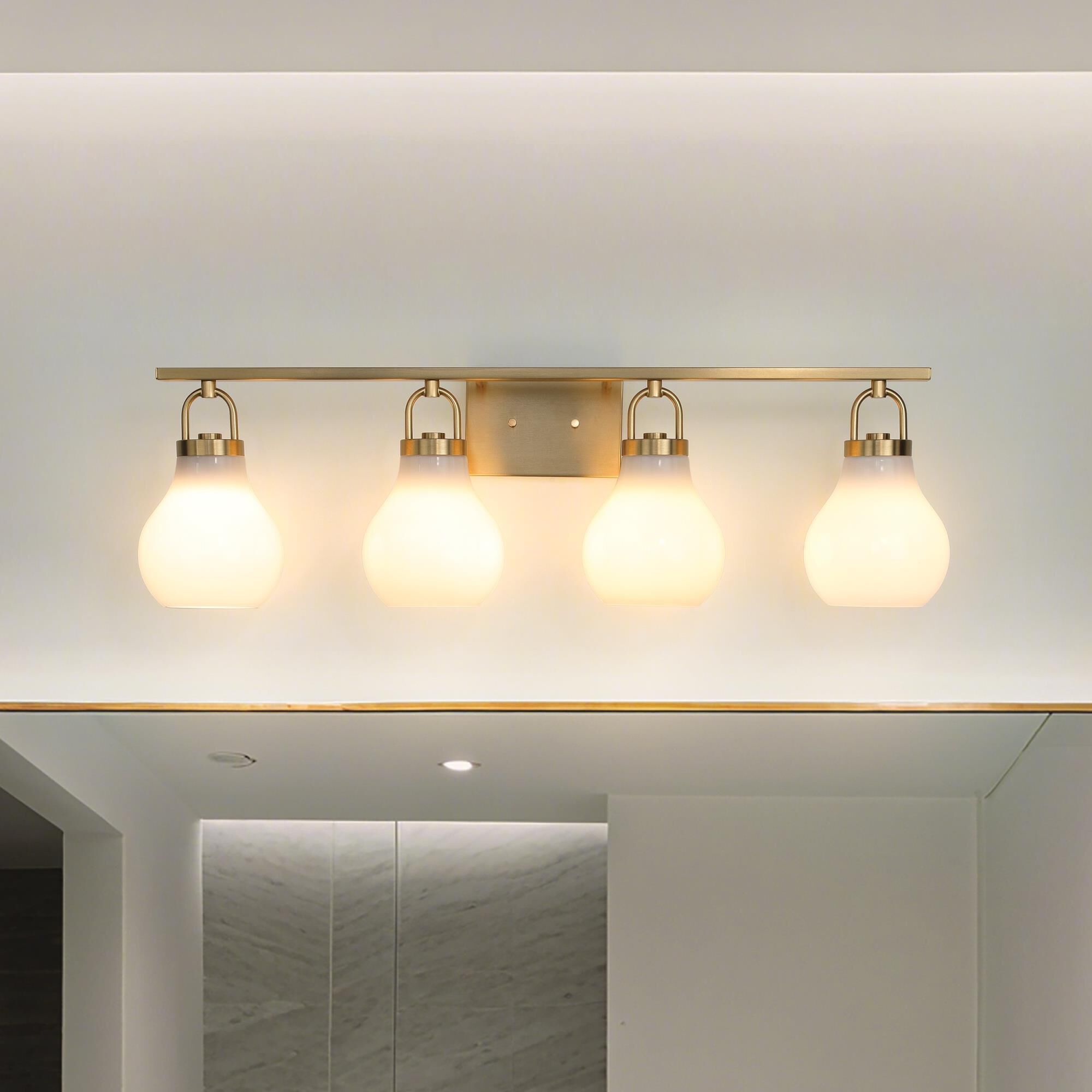 Shown in Champagne Gold finish and Opal glass