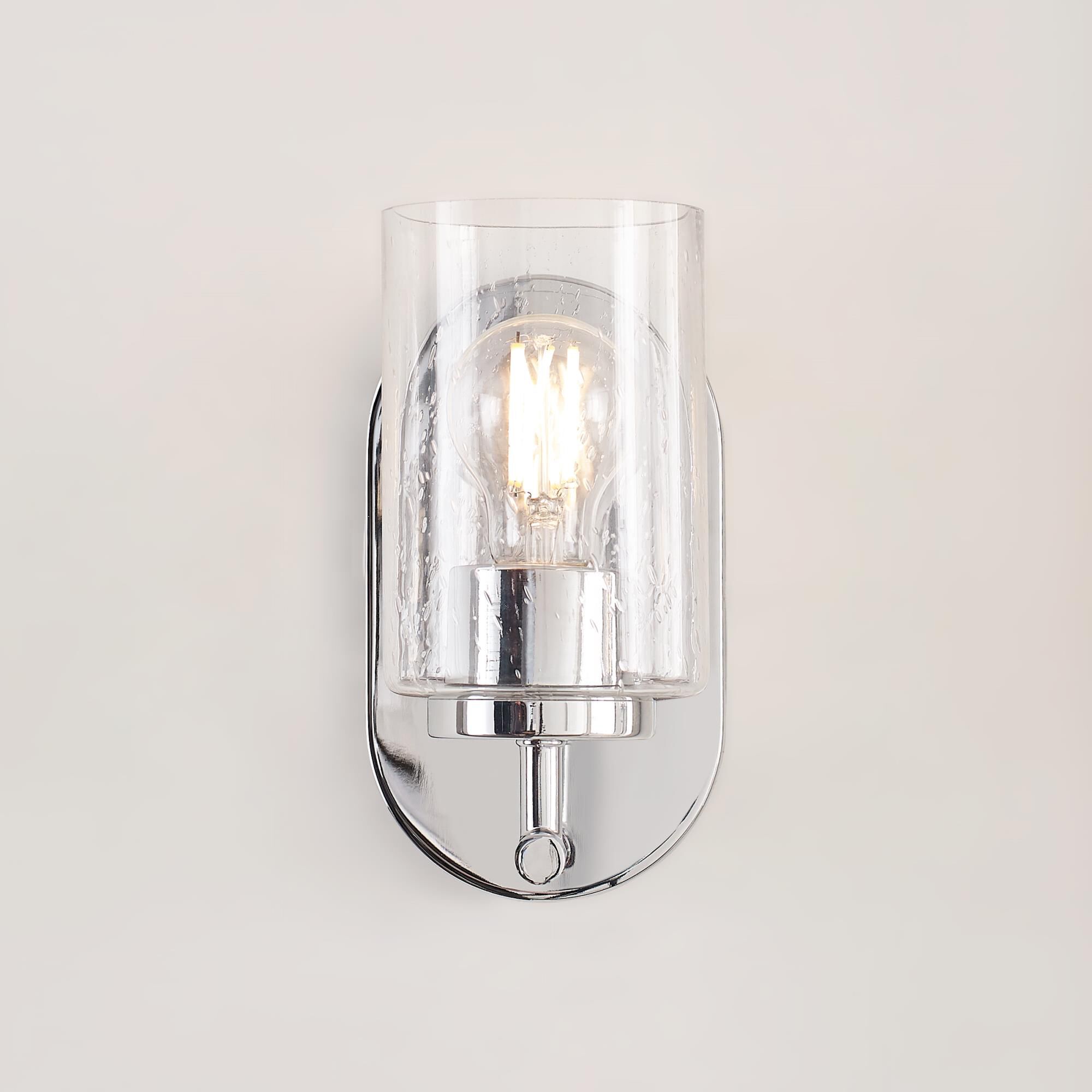 Shown in Chrome finish and Clear Seeded glass