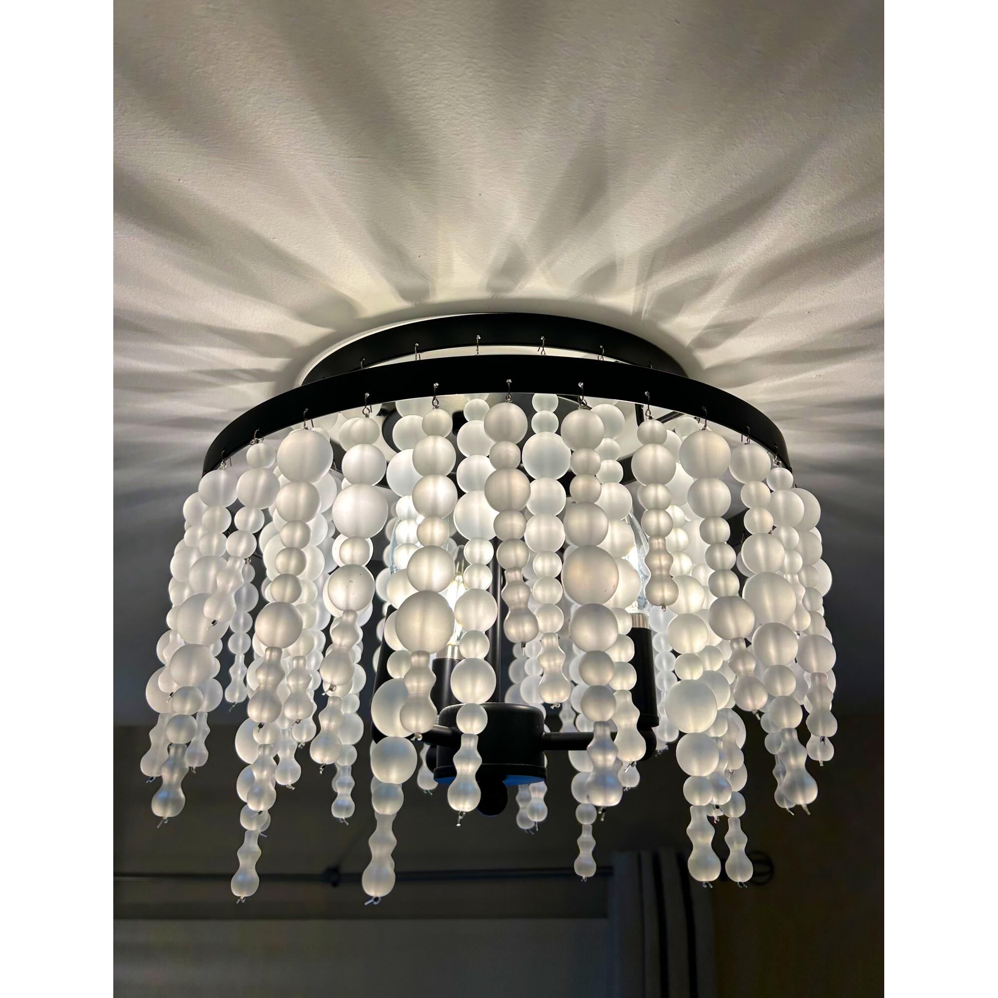 Shown in Matte Black finish and Frosted Beads glass