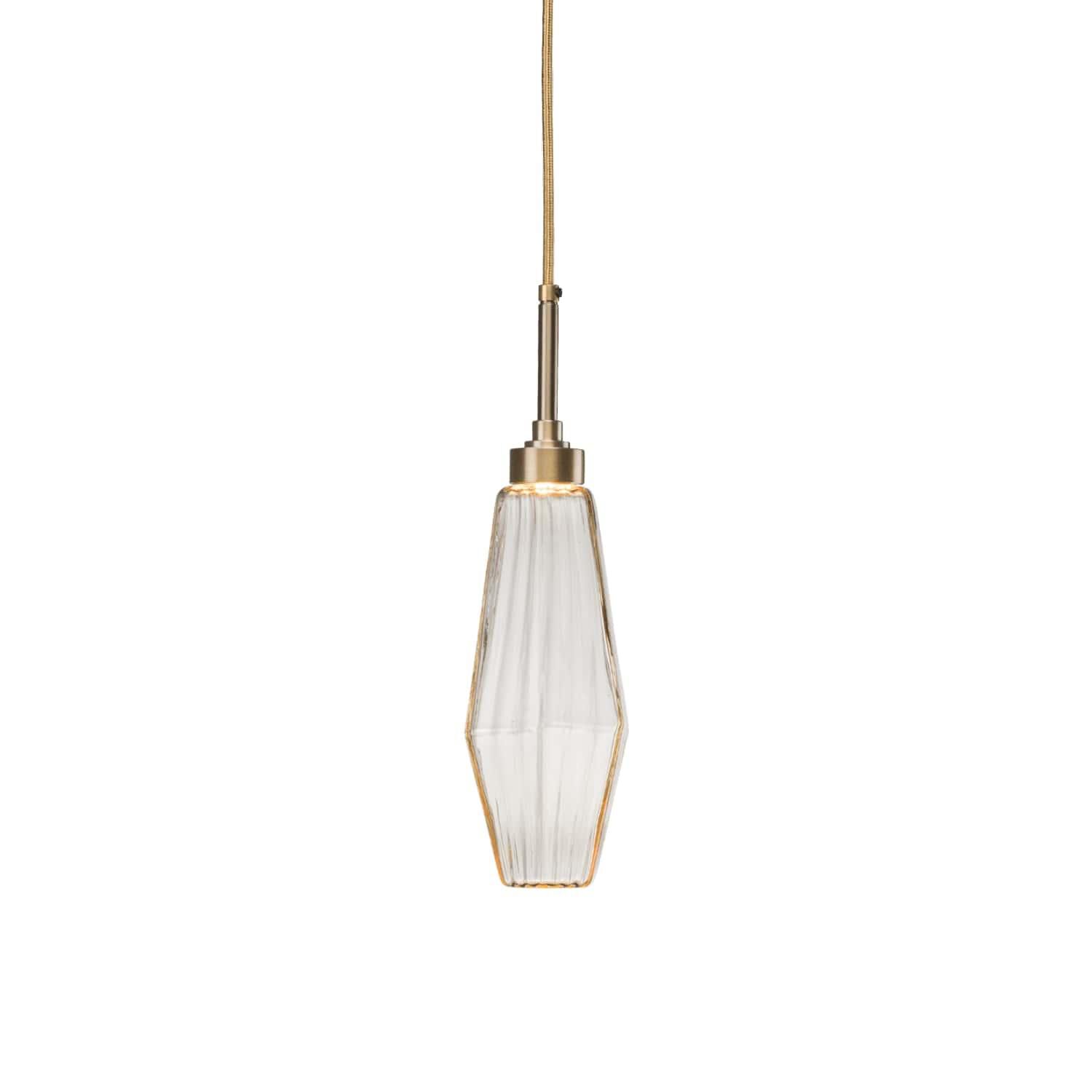 Shown in Heritage Brass finish and Optic Rib Amber glass