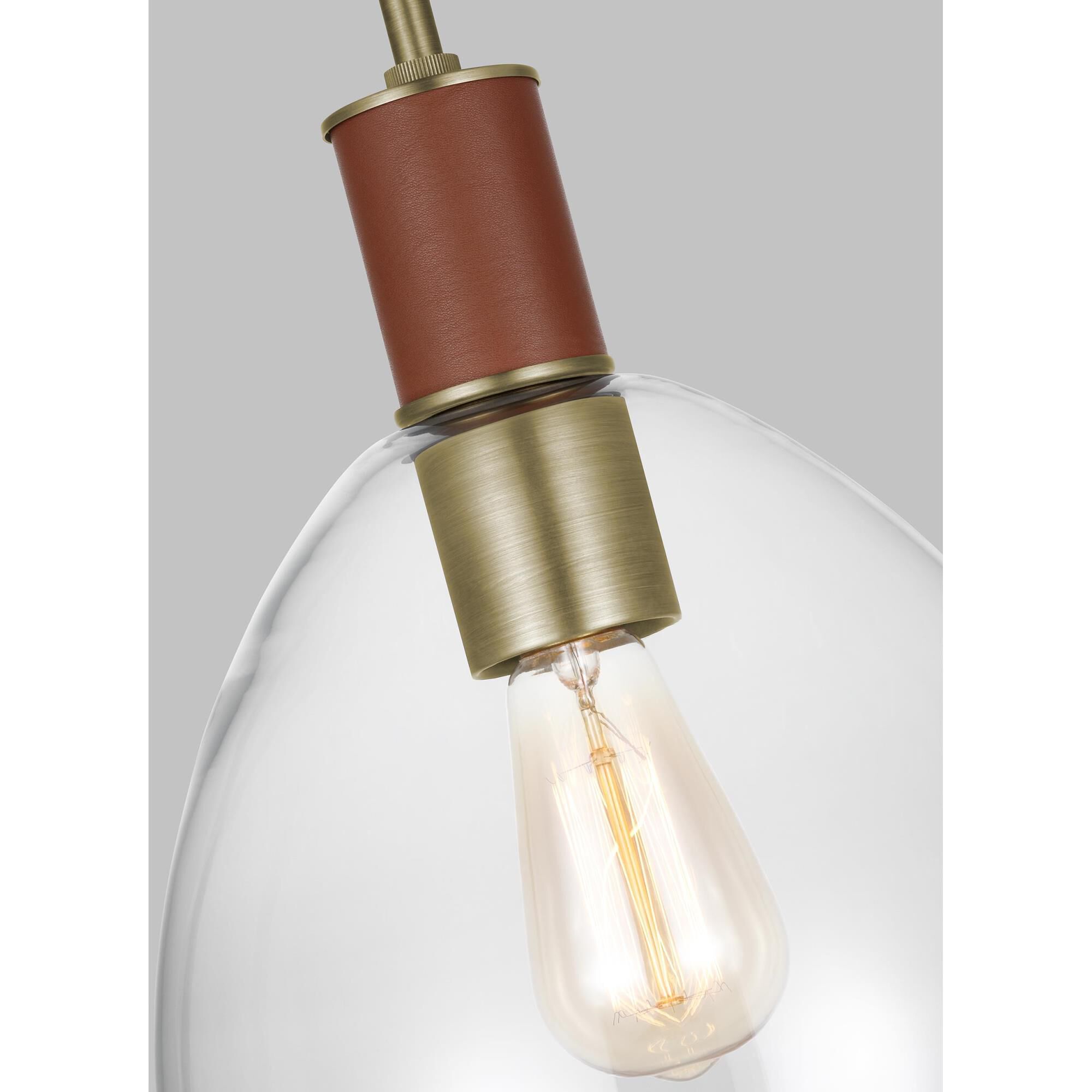 Shown in Time Worn Brass finish and Clear glass