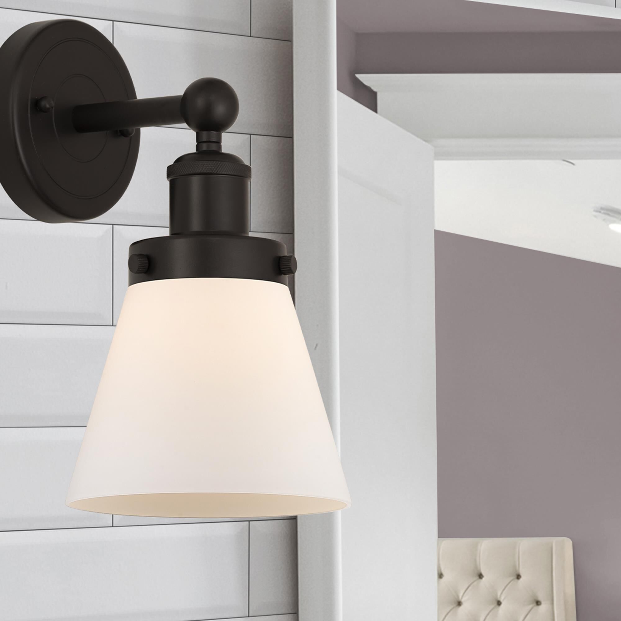 Shown in Oil Rubbed Bronze  finish and Matte White glass