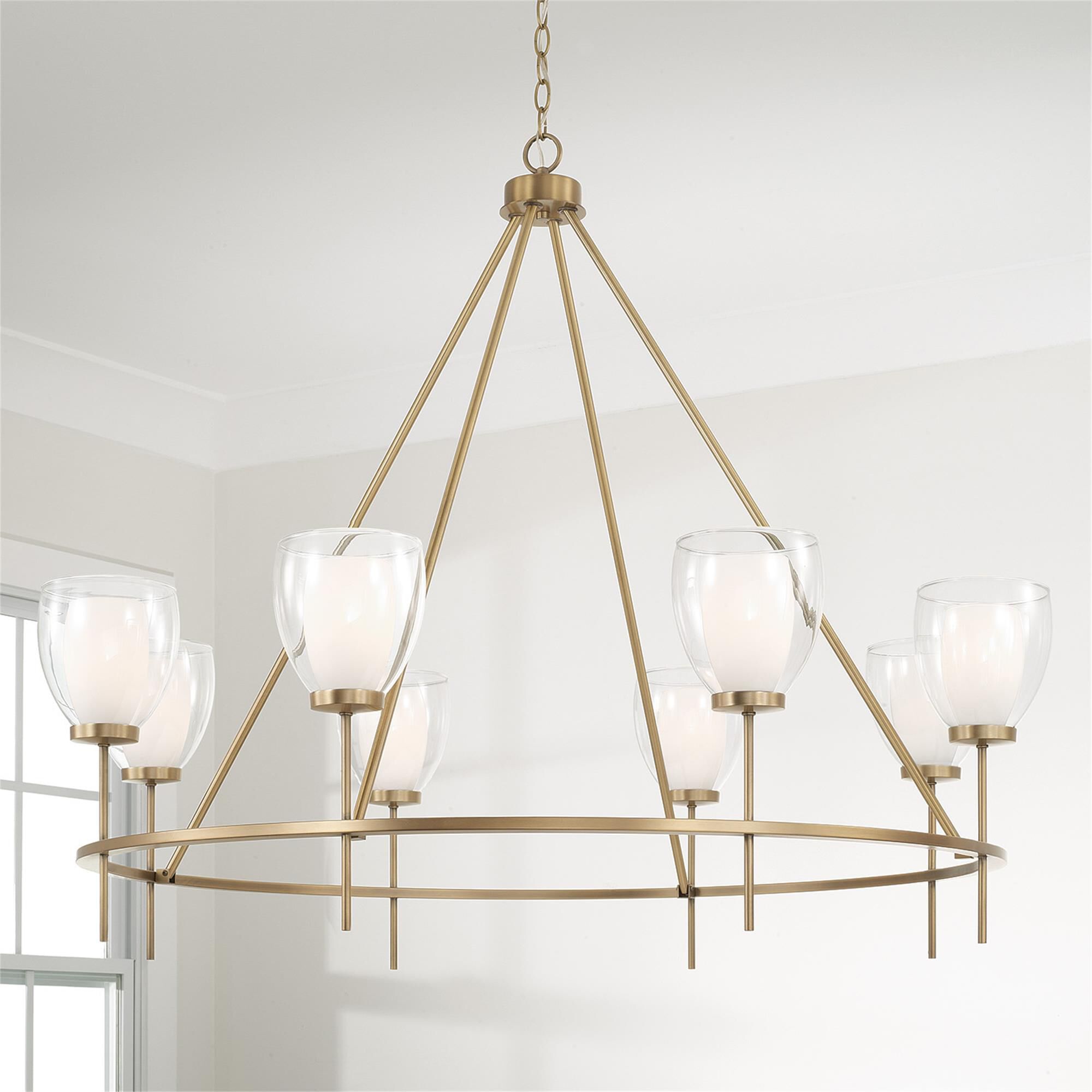 Shown in Aged Brass finish and Layered White And Clear glass