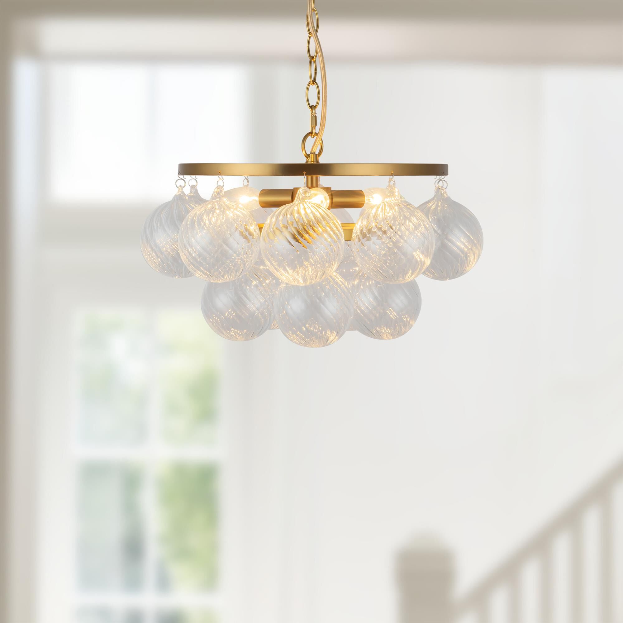 Shown in Brushed Gold finish and Clear Ribbed glass