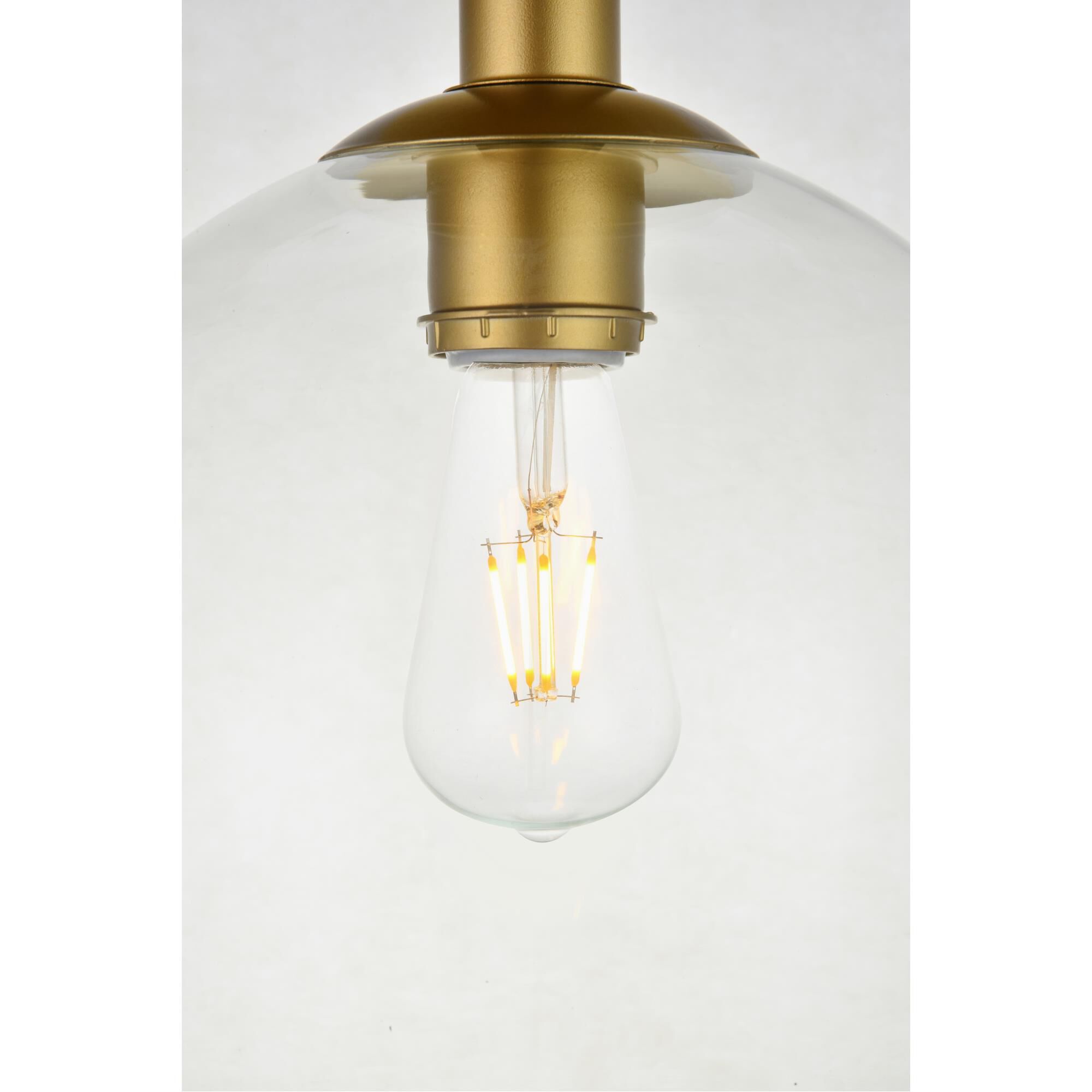 Shown in Brass finish and Clear glass