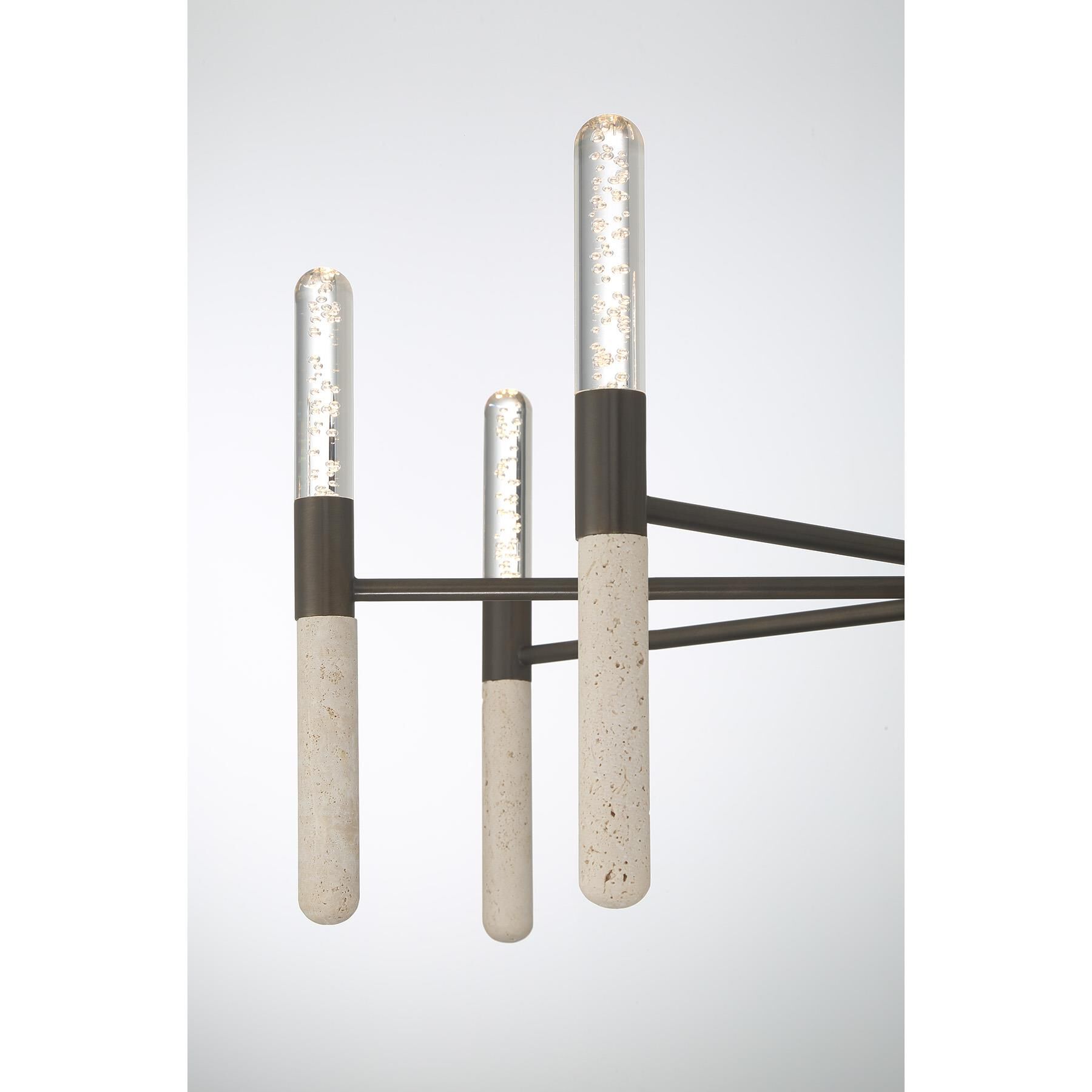 Shown in Mediterranean Bronze finish and Clear Seeded glass and Beige Travertine accent