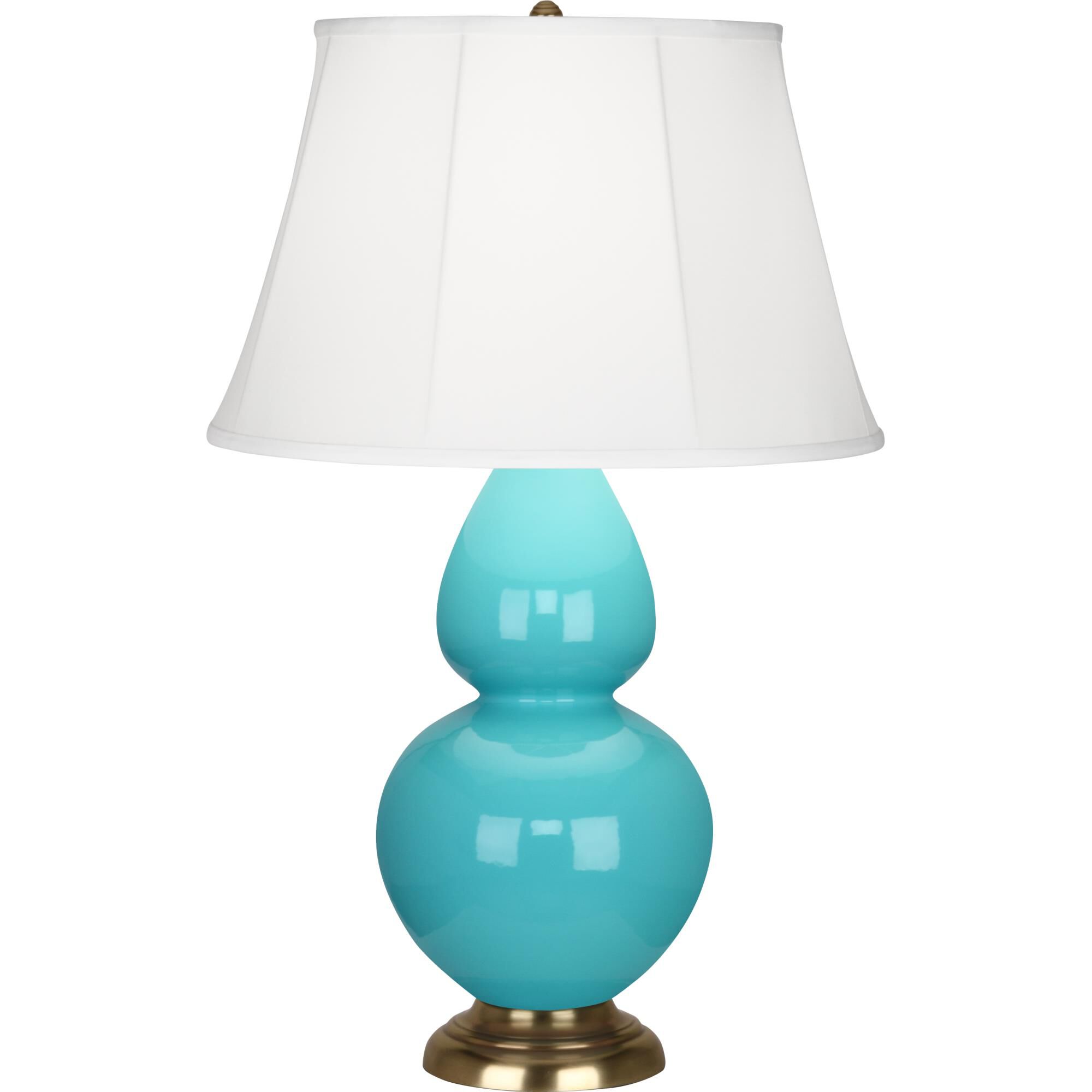 Shown in Egg Blue Glazed Ceramic With Antique Natural Brass ed Accents finish and Ivory Silk Stretched Fabric shade