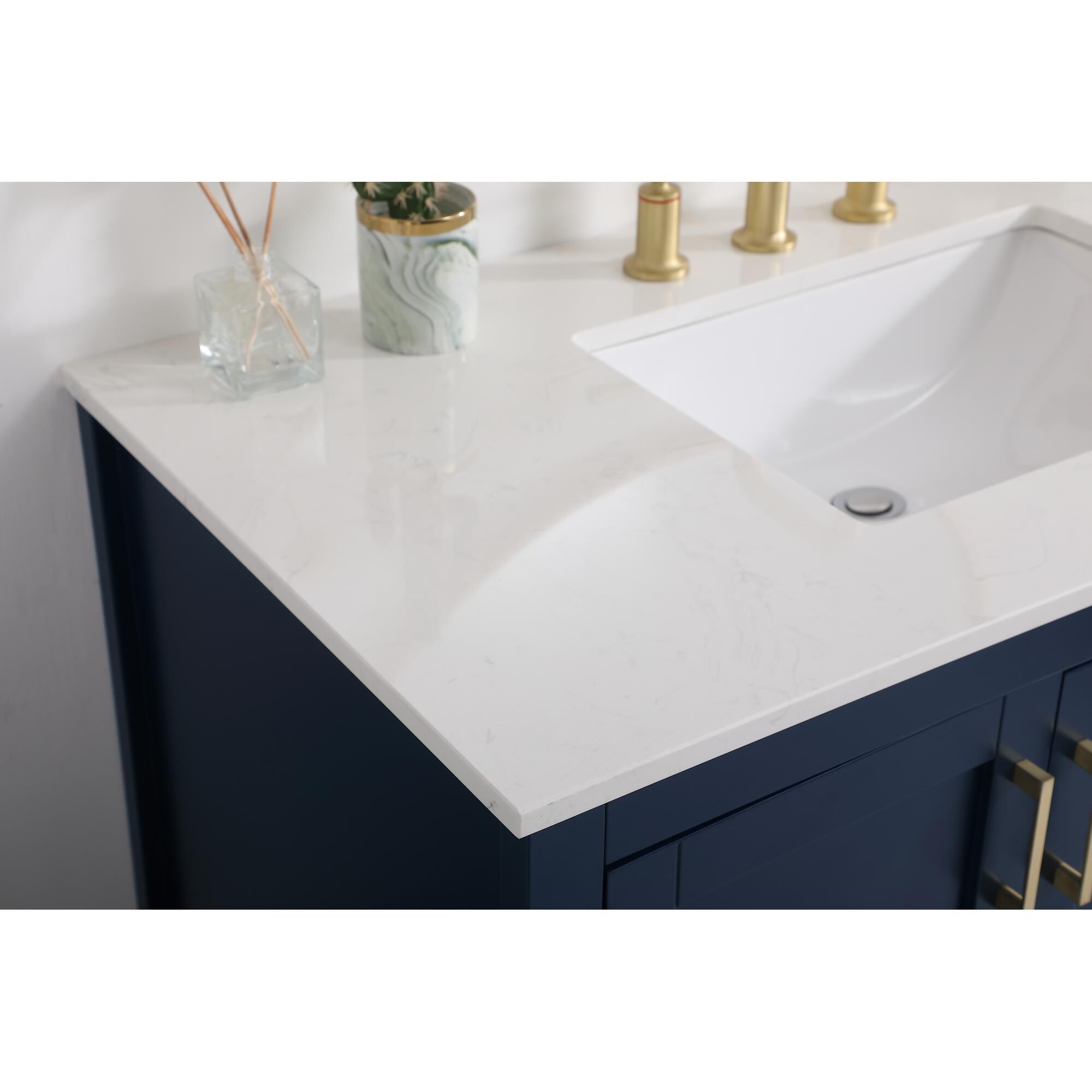 Shown in Blue And Gold With Calacatta Quartz finish