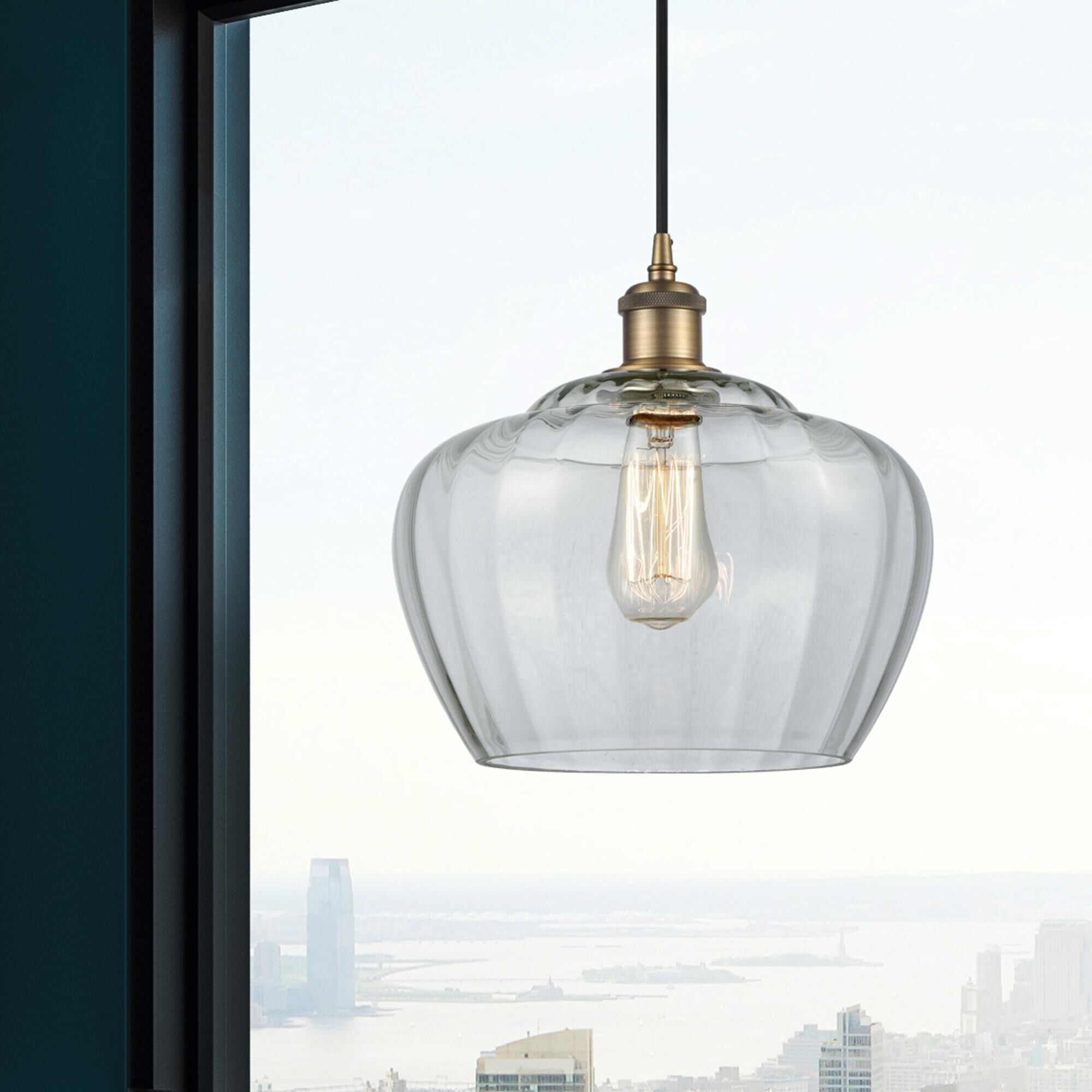 Shown in Brushed Brass finish and Large Clear Fenton glass and Polished Chrome accent