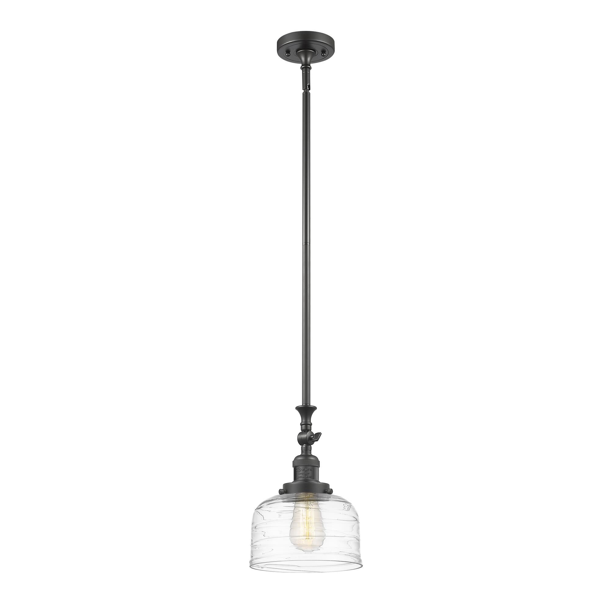 Shown in Oil Rubbed Bronze finish and Clear Deco Swirl Large Bell glass
