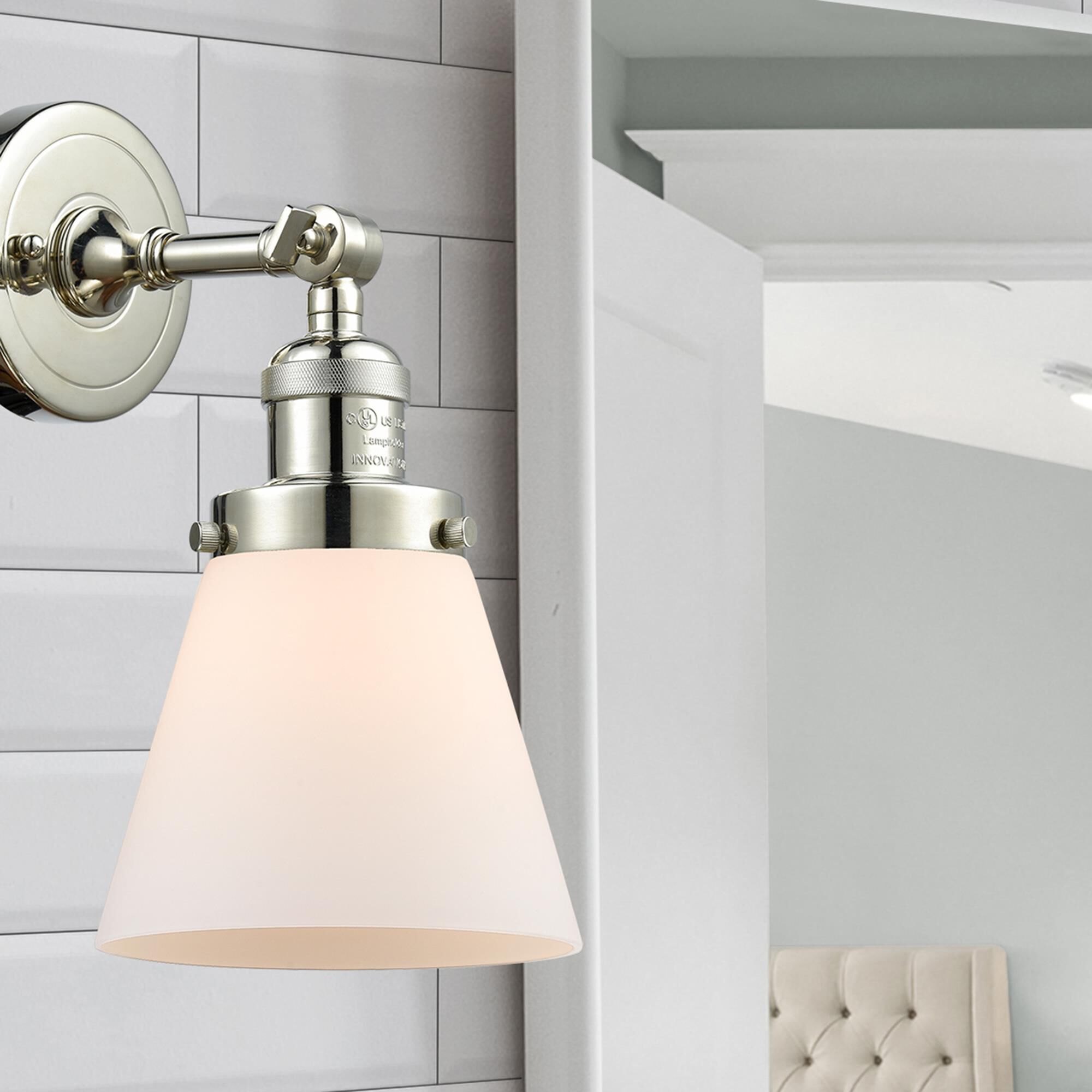 Shown in Polished Nickel finish and Matte White Cased glass