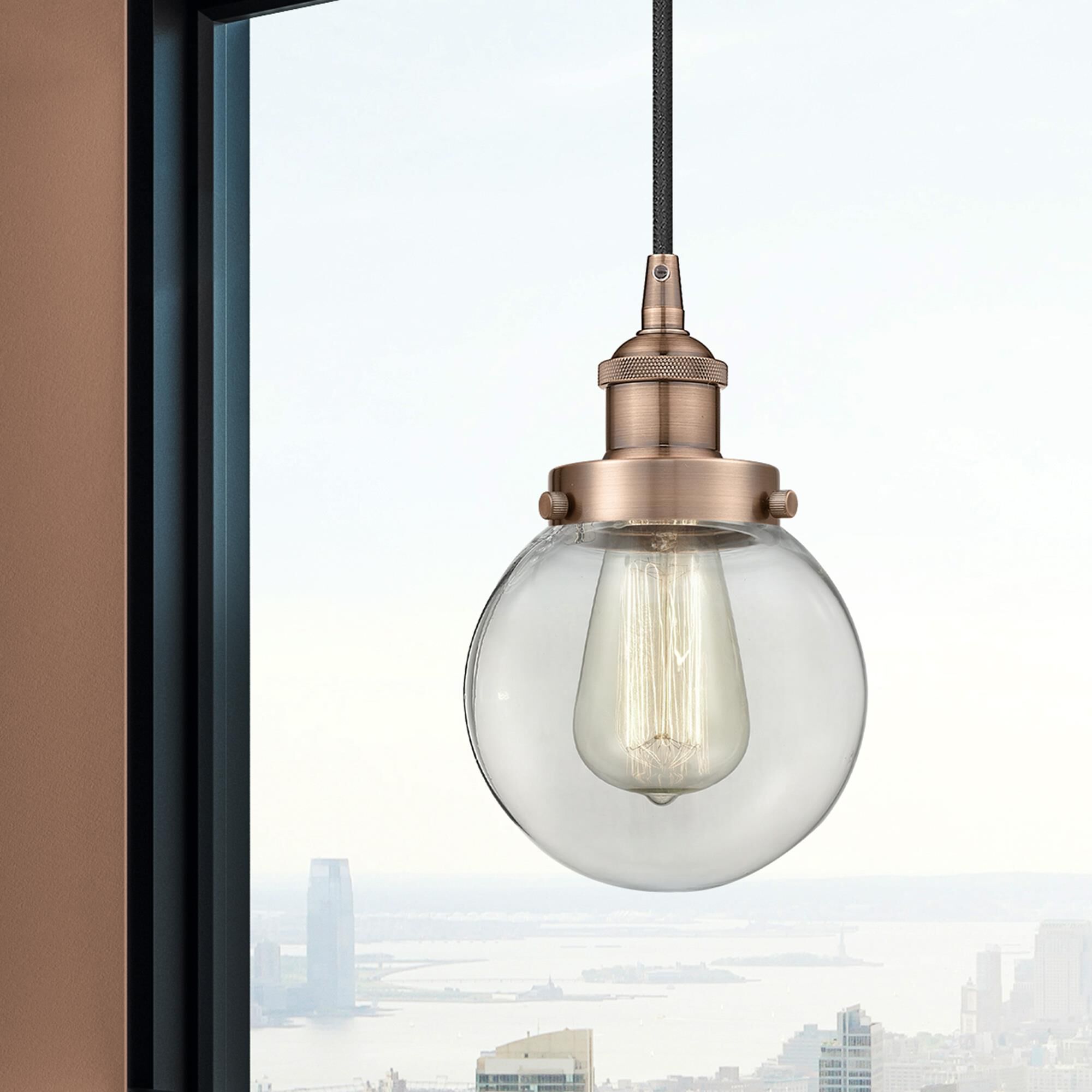 Shown in Antique Copper finish and Clear glass