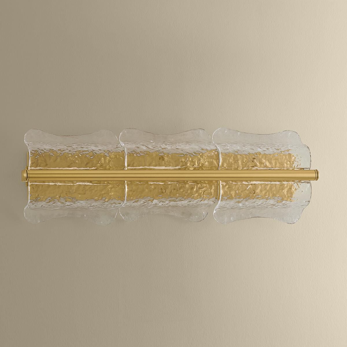 Shown in Aged Brass finish and Clear Optic glass