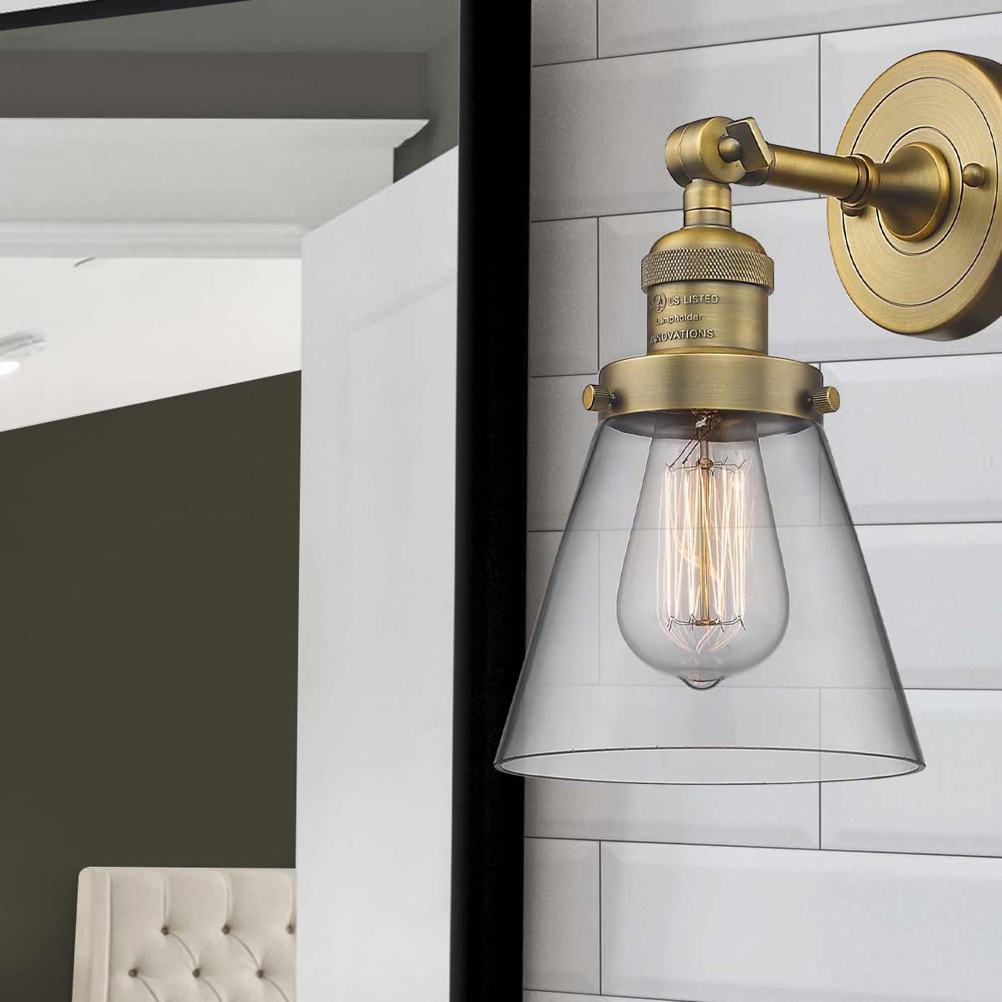 Shown in Brushed Brass finish and Clear glass