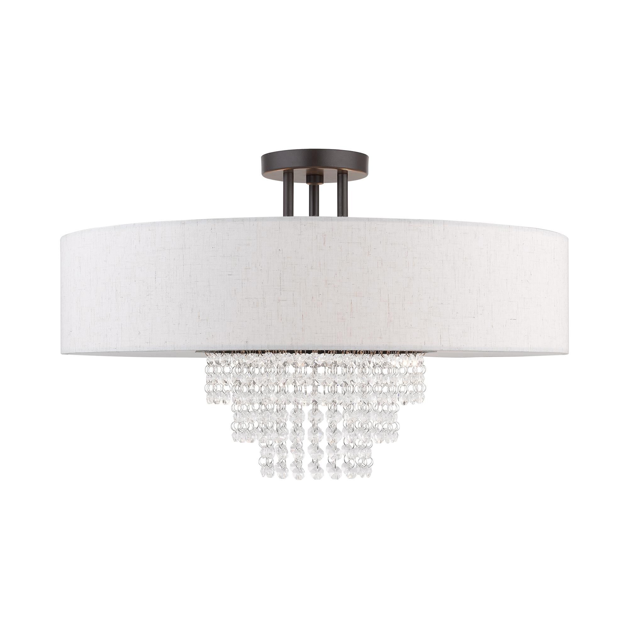 Shown in English Bronze finish and Hand Crafted Oatmeal Color Fabric Outside & White Fabric Inside Hardback  with Clear Crystals shade