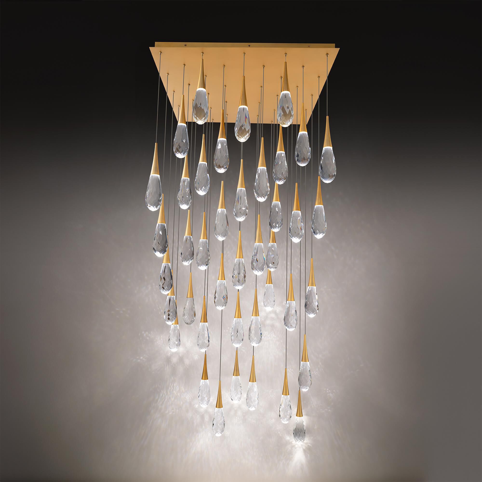 Shown in Aged Brass finish and Optic Crystal crystal