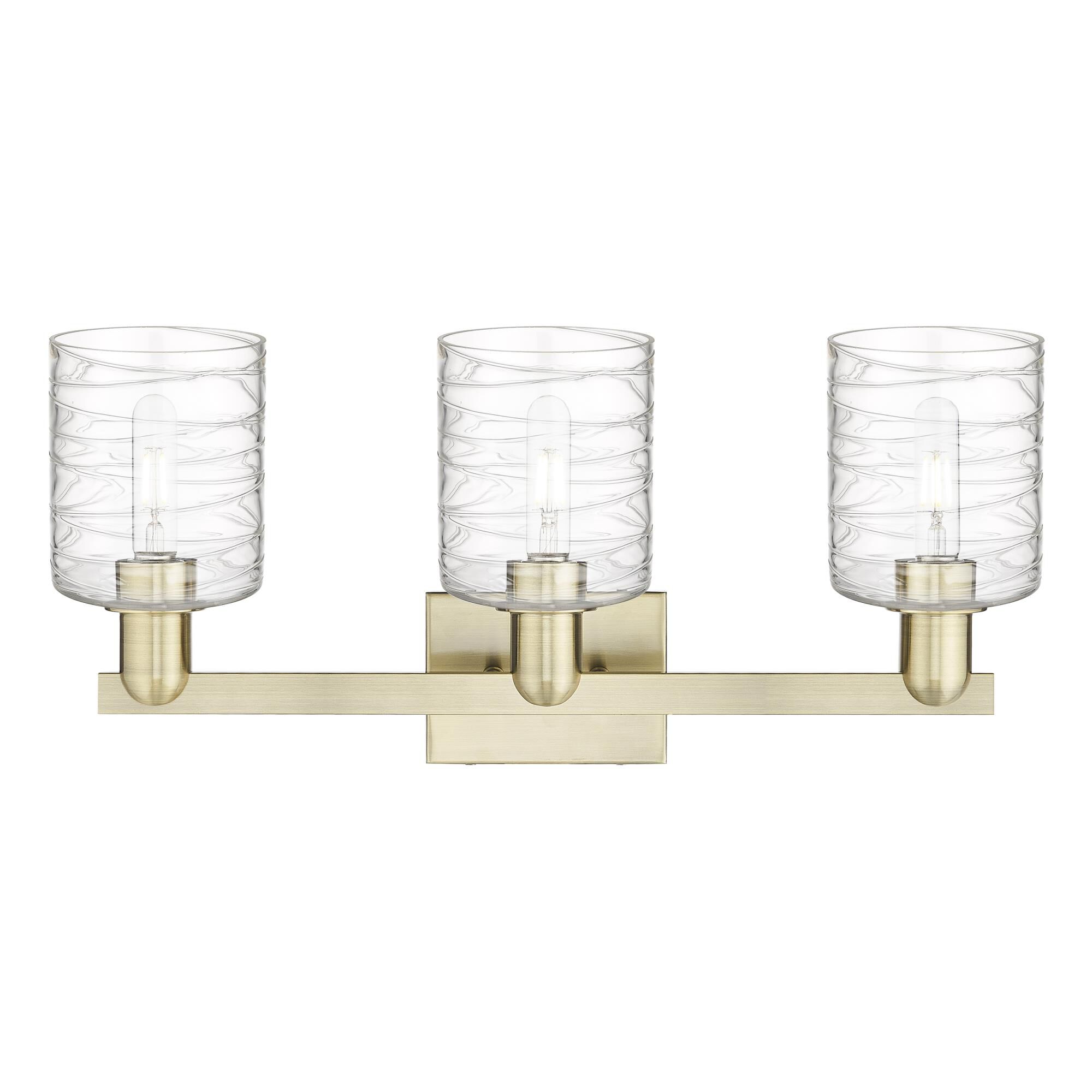 Shown in Antique Brass finish and Deco Swirl glass