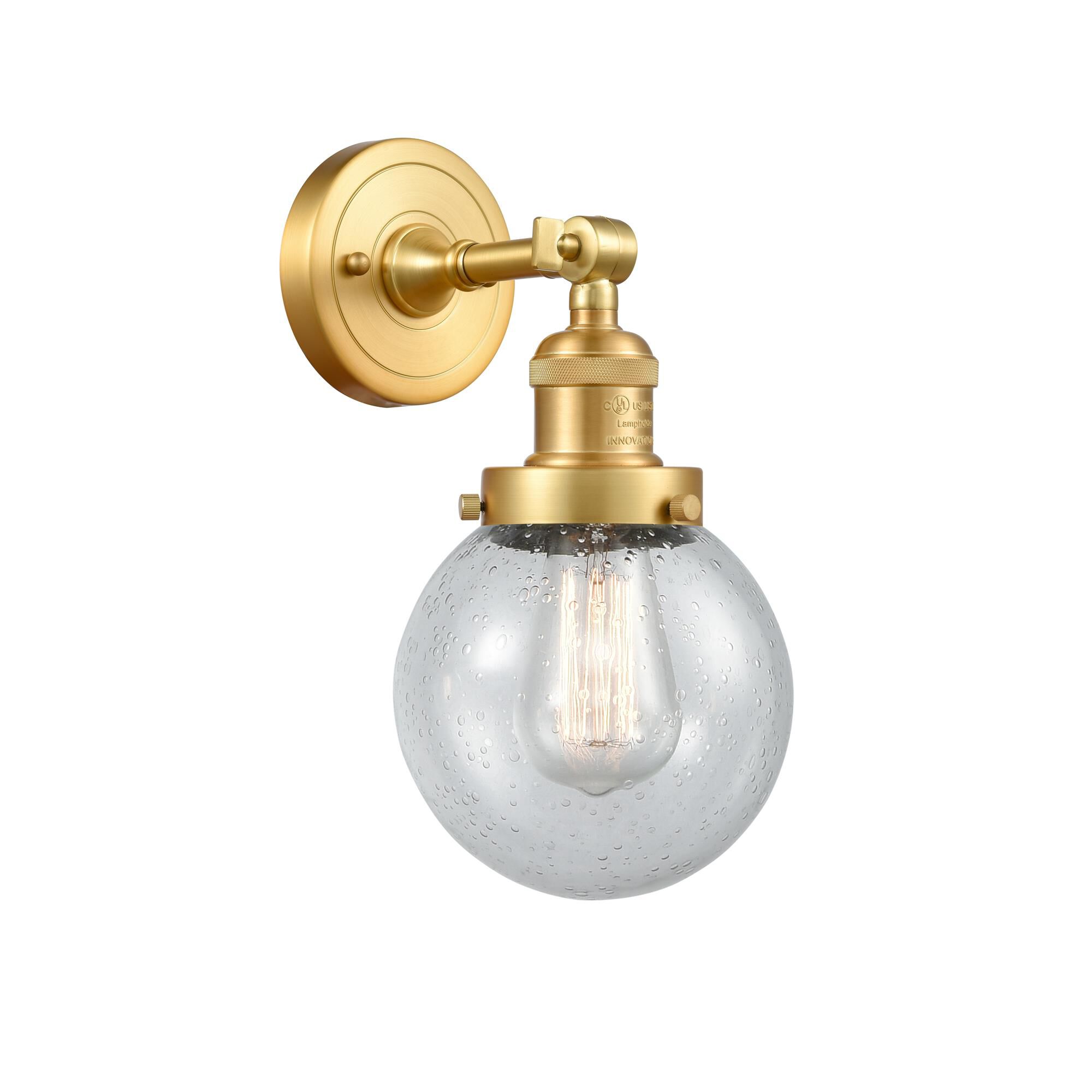 Shown in Satin Gold finish and Seedy Beacon glass