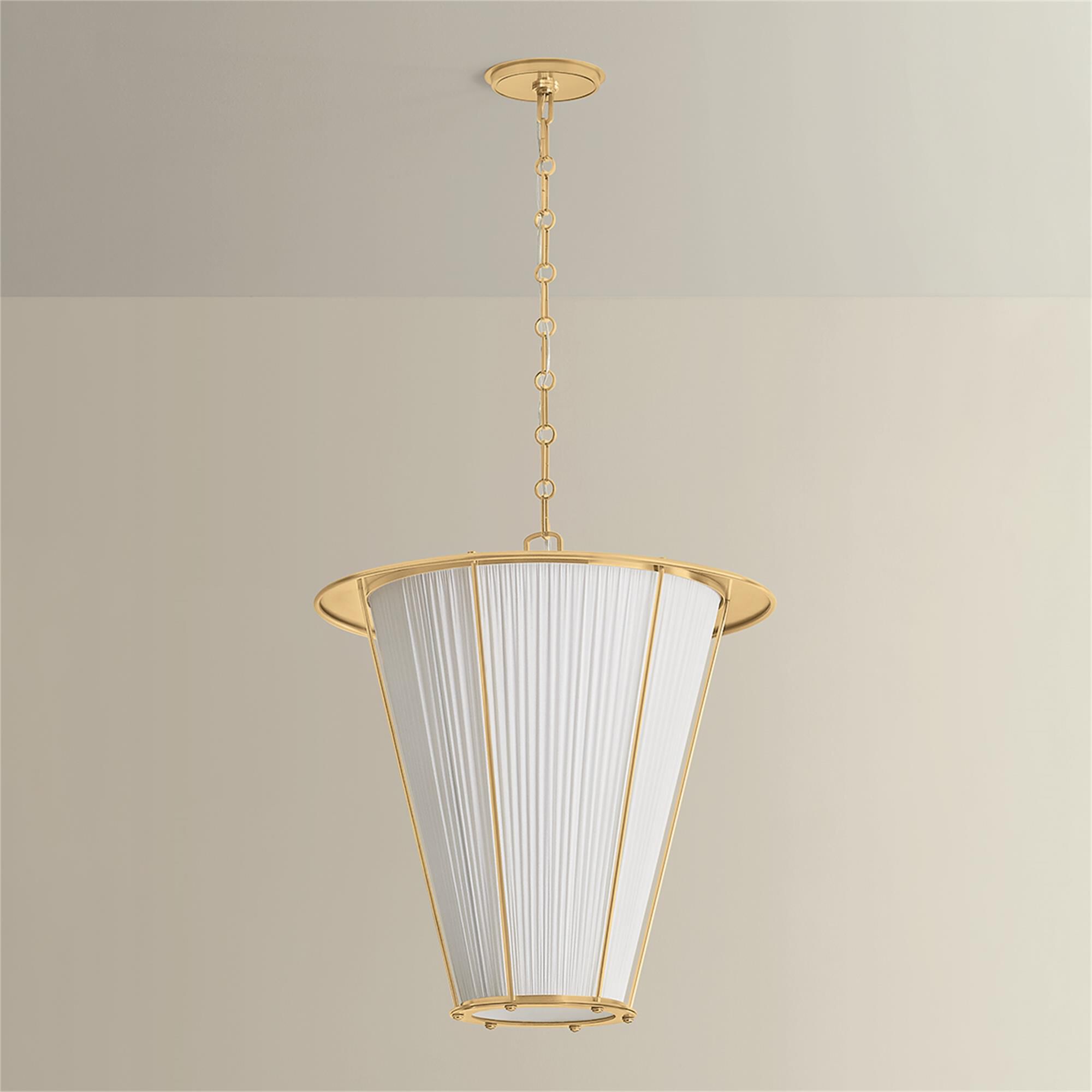 Shown in Aged Brass finish and Ivory Silk shade
