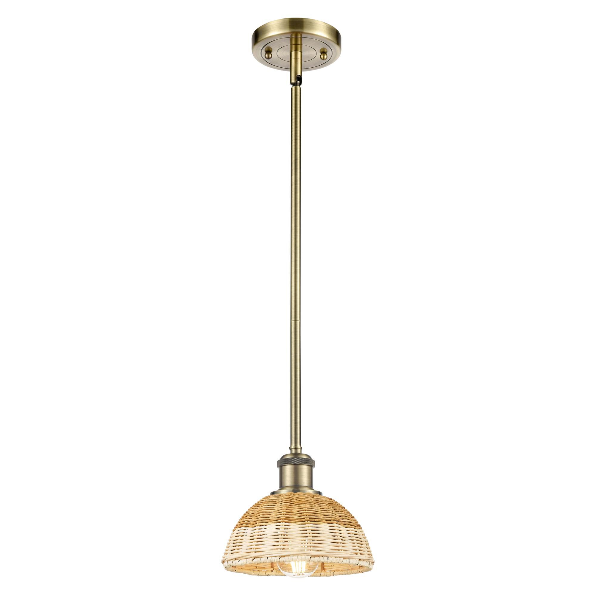 Shown in Antique Brass finish and Natural shade