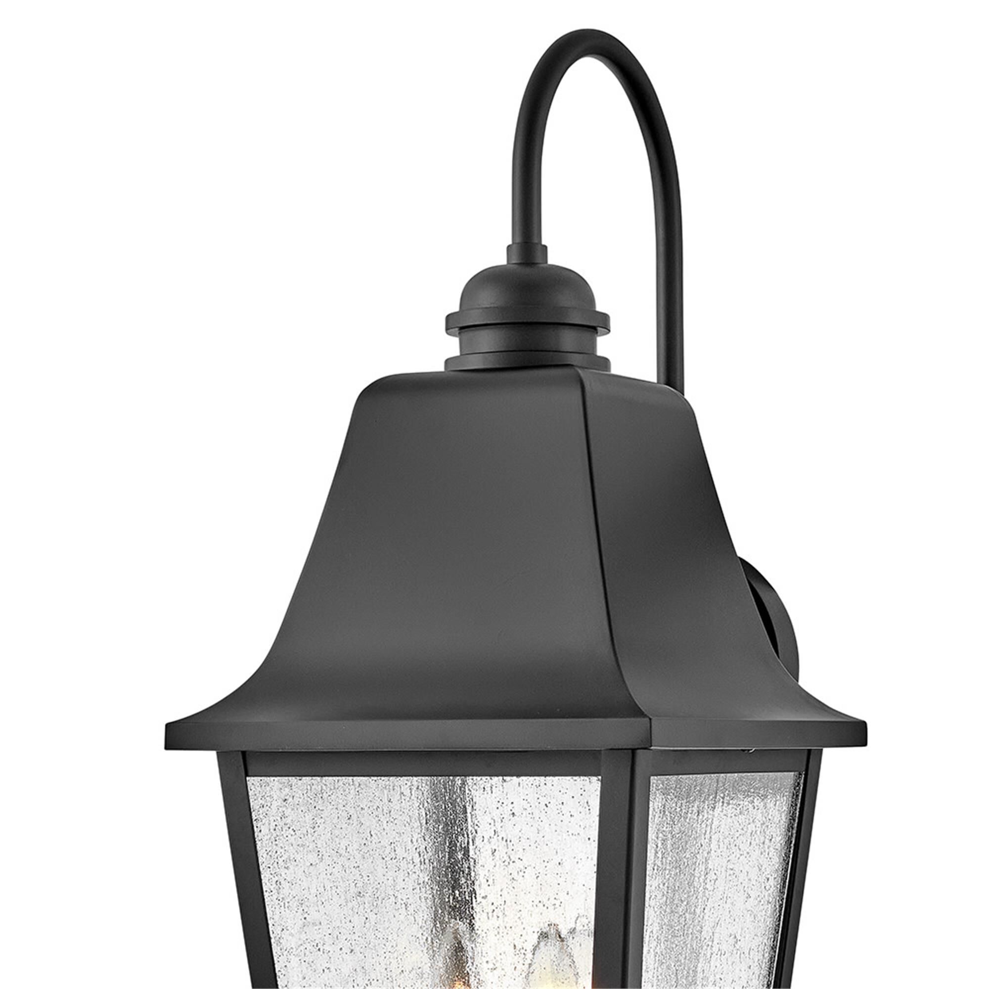 Shown in Black finish and Clear Seedy glass